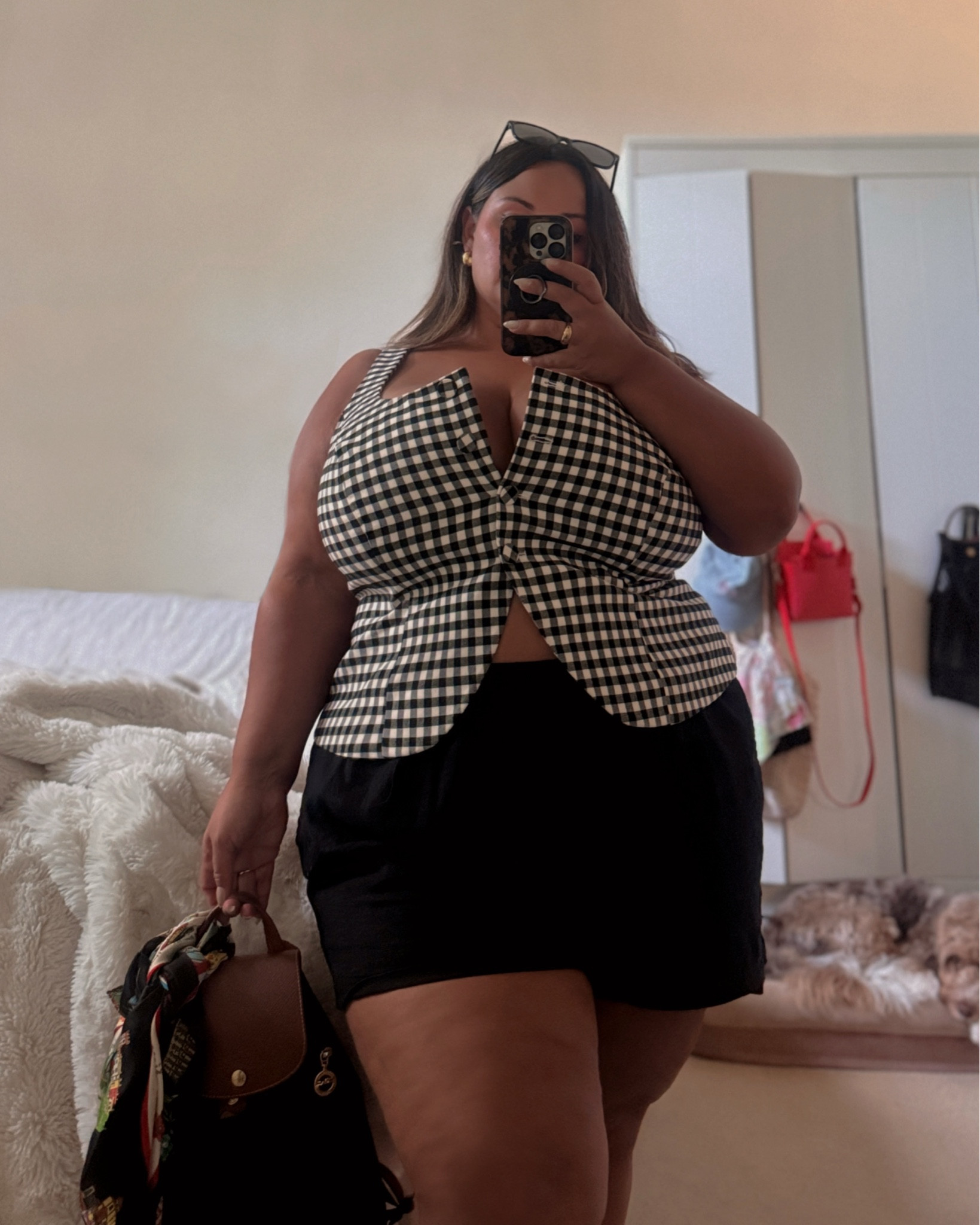 If Eloquii could make this top in EVERY color, I would buy them ALL. This gingham vest is so chic and versatile. The fit is spectacular. Has a little stretch with a bit of structure. Pair with black linen shorts, the matching skirt, wide leg  trousers, or a mini skirt! Ugh, I just love it so much. Perfect top to transition from summer to fall. 



#LTKMidsize #LTKPlusSize #LTKSaleAlert