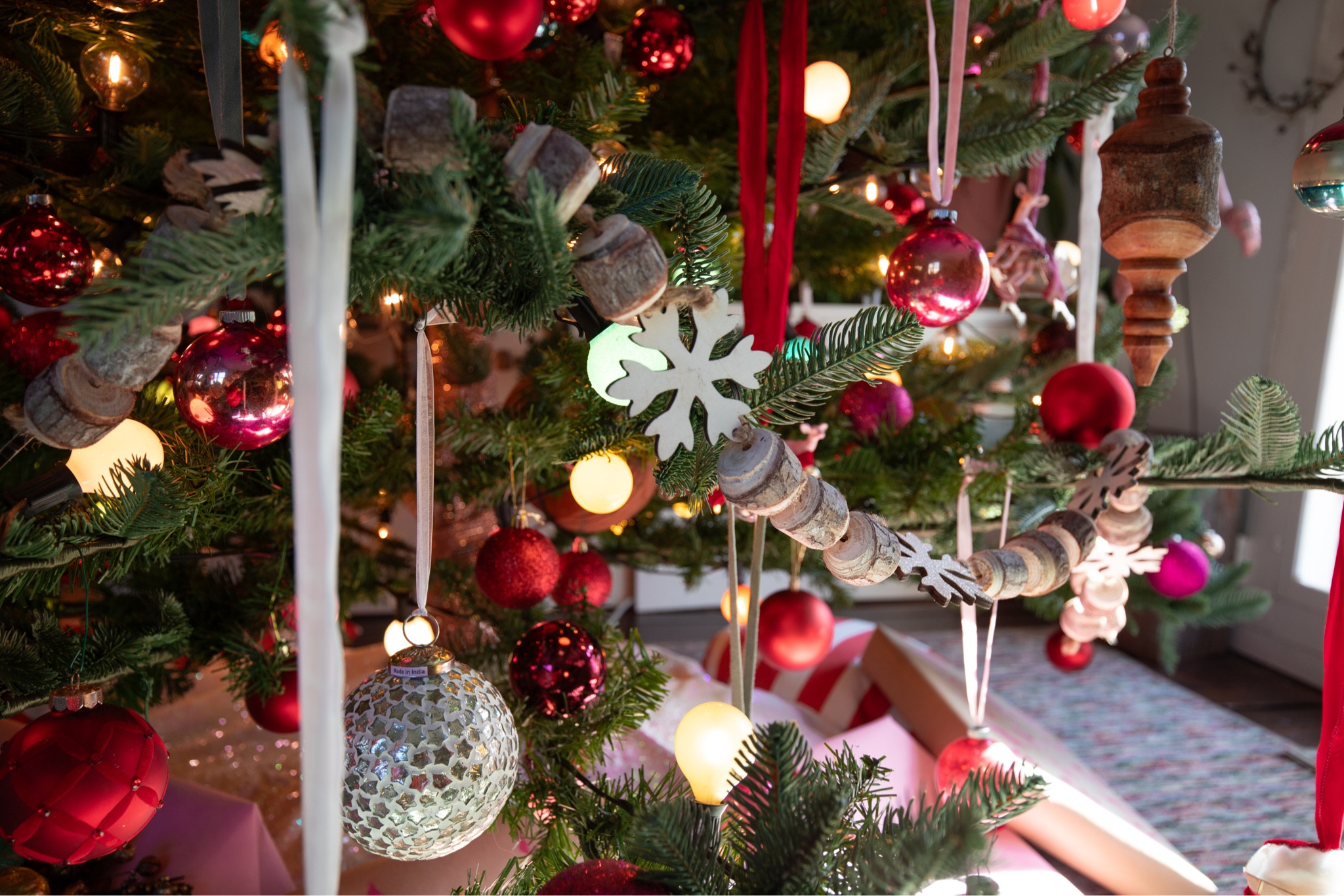Close up of the wooden (marshmallow) garland and all the pretty ribbon 🎀 

#LTKHoliday