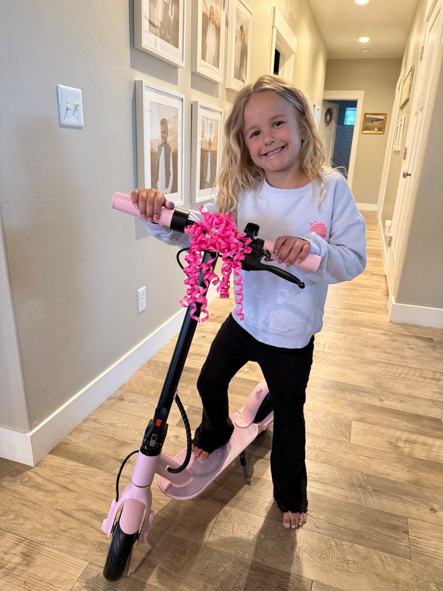 The electric scooters we got our kids! (Pink- 6 year old. Black- 9 year old, but it can hold even my husband)

#LTKKids