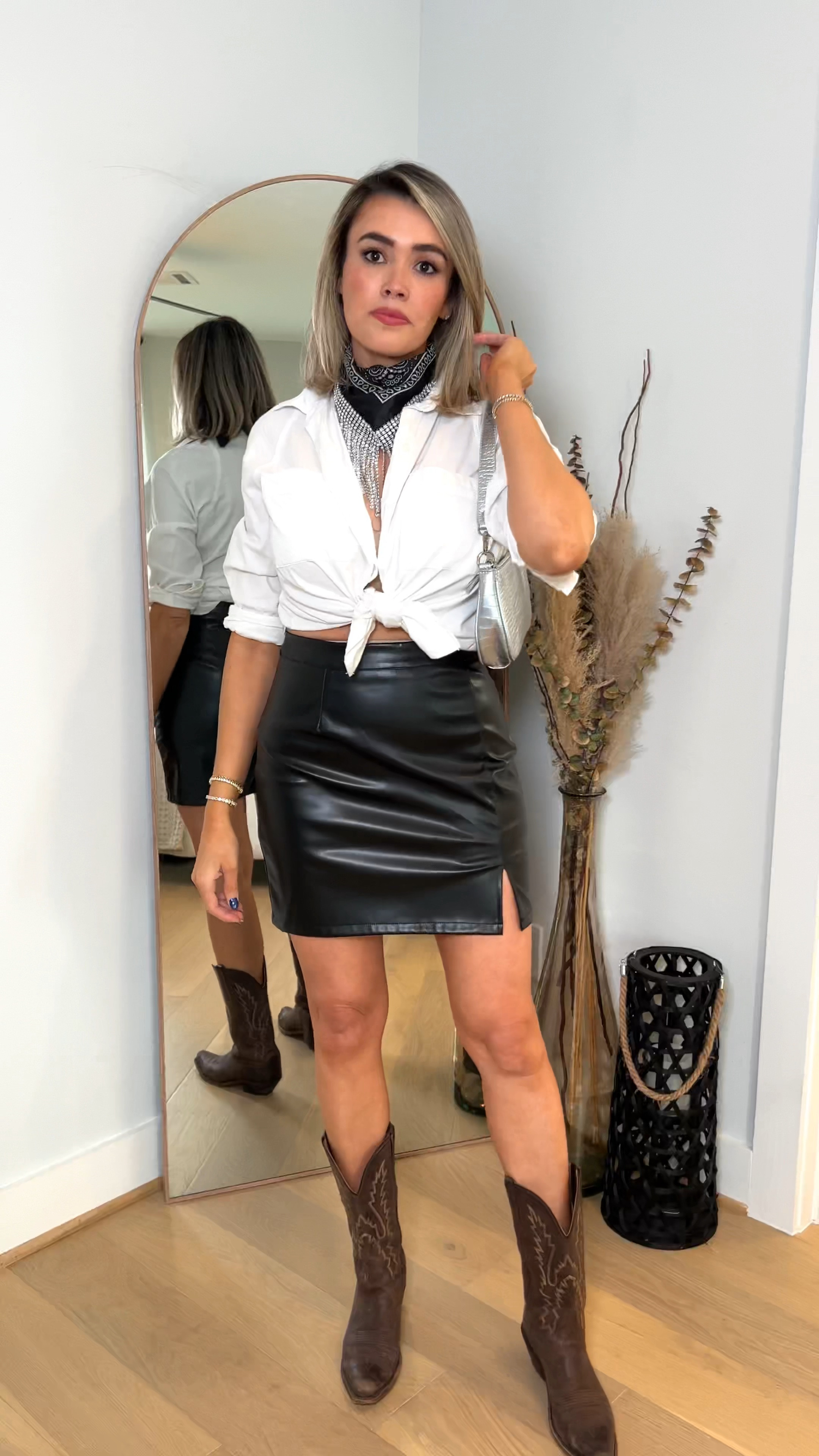 Cute Rodeo look for my girlies! Super simple and affordable! I am wearing a medium in the skirt and top! The fringe bandana pulls the look together, comes in a two pack. The handbag is perfect to carry the essentials and I’m loving the silver trend! My boots are over 15 years old so I am unable to link them but I’m linking some newer styles. My bracelets look expensive but they aren’t 🎉 save 10% off with code Janie. 

I am 5’8 143lbs for size reference. 

#LTKfindsunder50 #LTKstyletip 

#LTKSeasonal