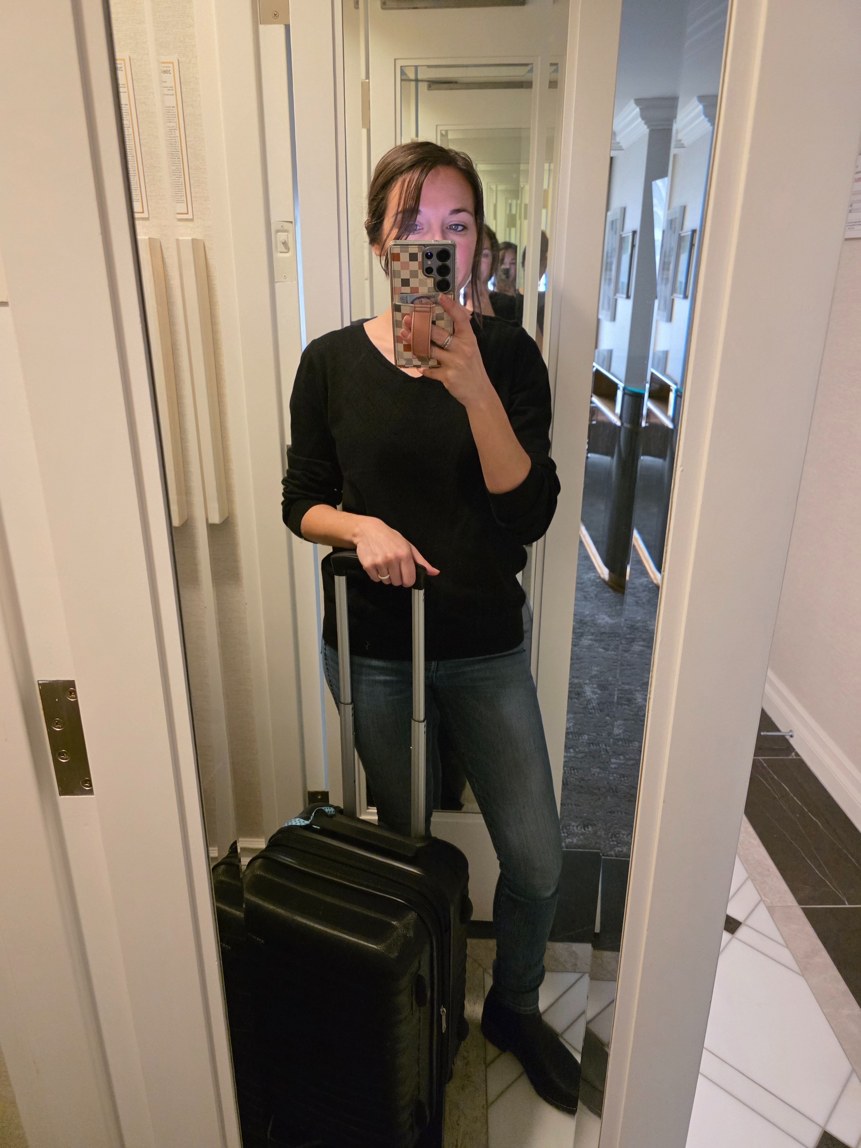 Travel outfit for a long day of airplane hopping. Comfy black sweater that is totally worth the link rolling it will require to make it in my closet, my favorite Madewell skinny jeans and the best leather Chelsea boots you'll ever own.  

 #LTKootd #LTKPetite #LTKTravel