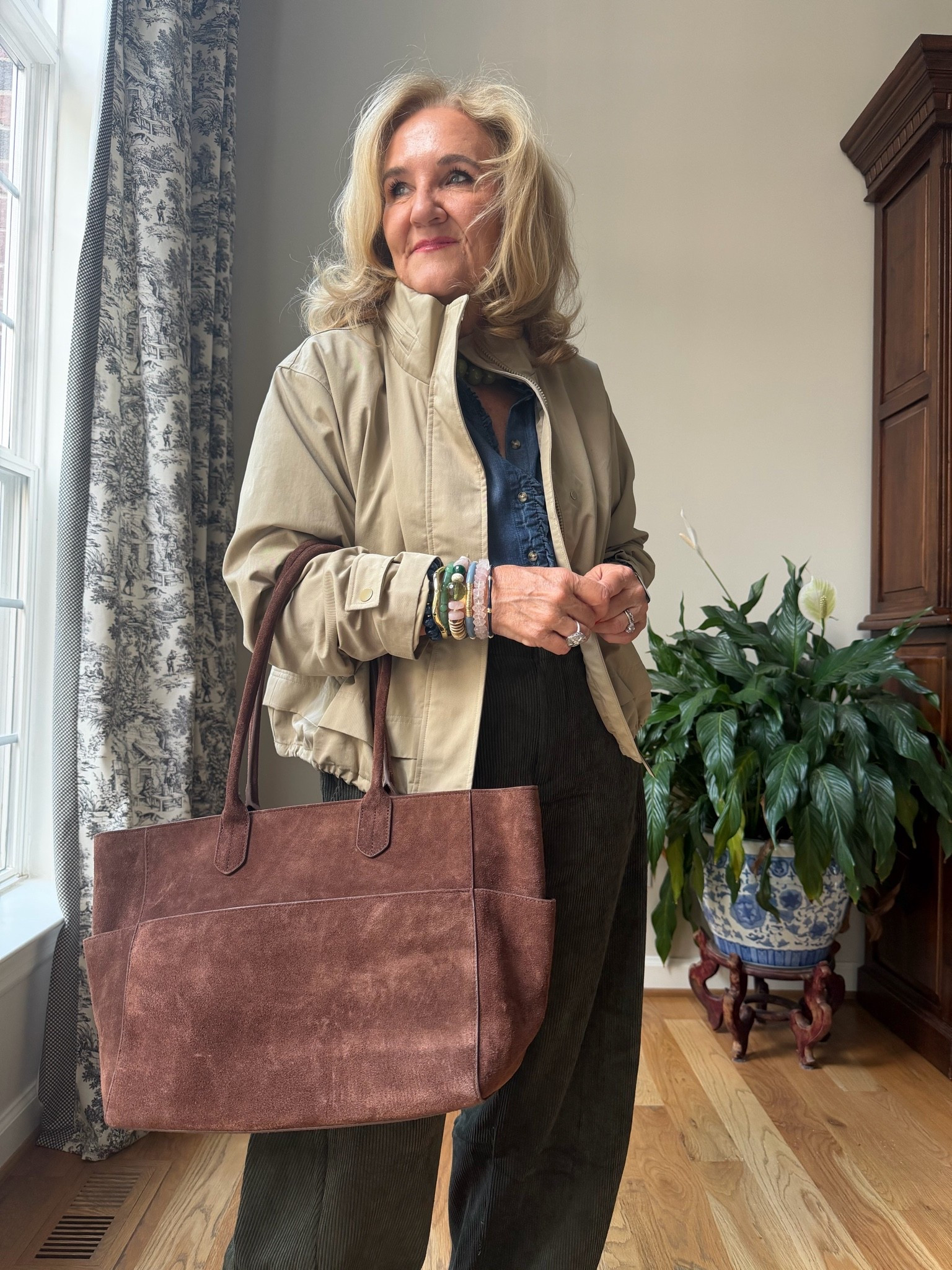 Take $55 off your @Ruti order even these new corduroys barrel pants. I’m wearing a size 10 regular. They do not come in a petite. I did size up. I actually wish I had stayed true to size. It just depends on how you want them to fit. There’s elastic in the back so plenty of room in the waist.

@athleta Jacket is a medium petite. It is a water, resistant rain jacket, and there’s a hood as well.
Tencel chambray blouse size medium
20% off my bracelet stack code NANETTE20 
Fallout fall travel outfit

#LTKOver40 #LTKootd

#LTKTravel #LTKSeasonal