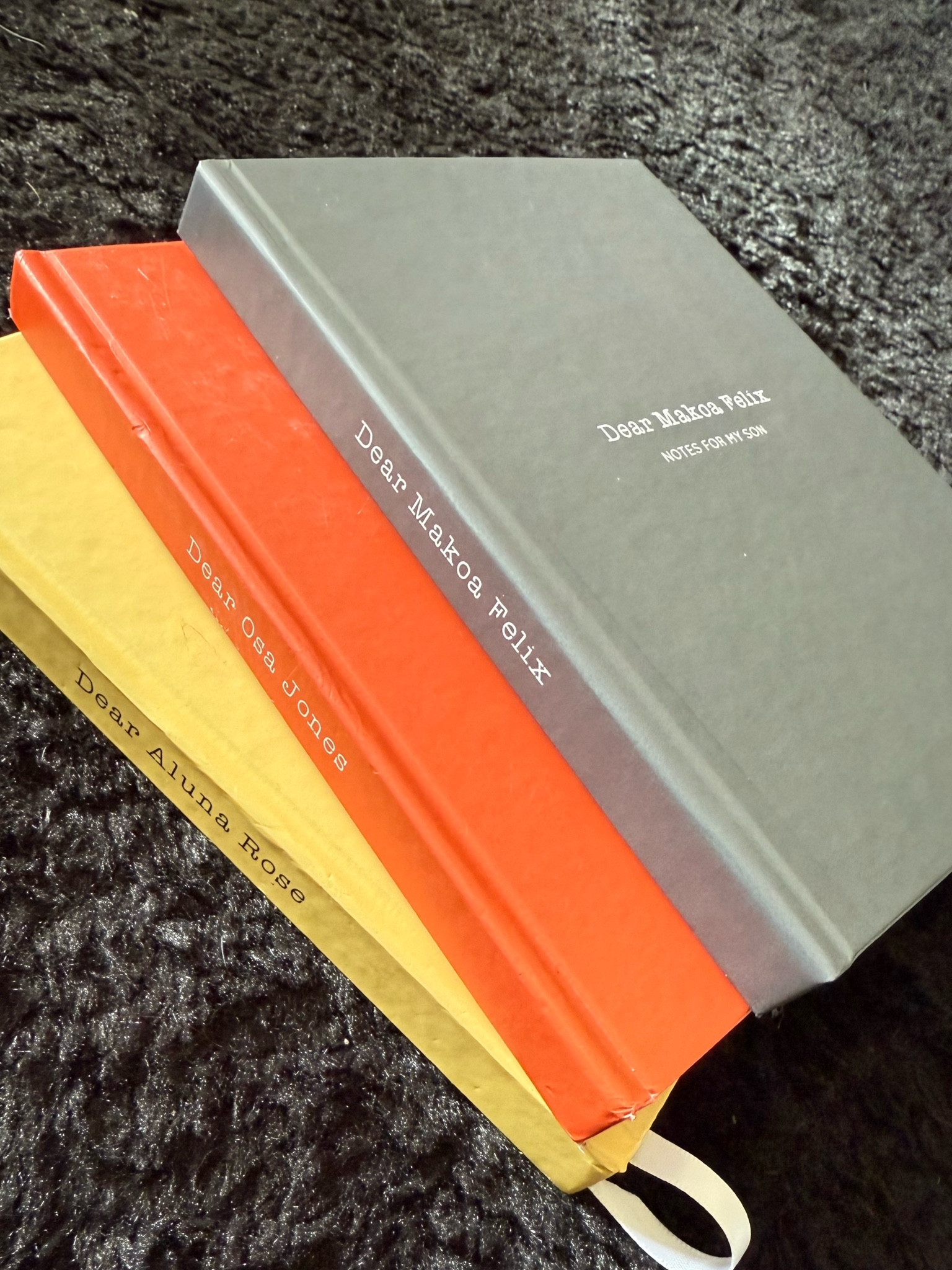 I love these custom notebooks that I write notes for each of my kiddos.  Now that Makoa is here, I just started his today!