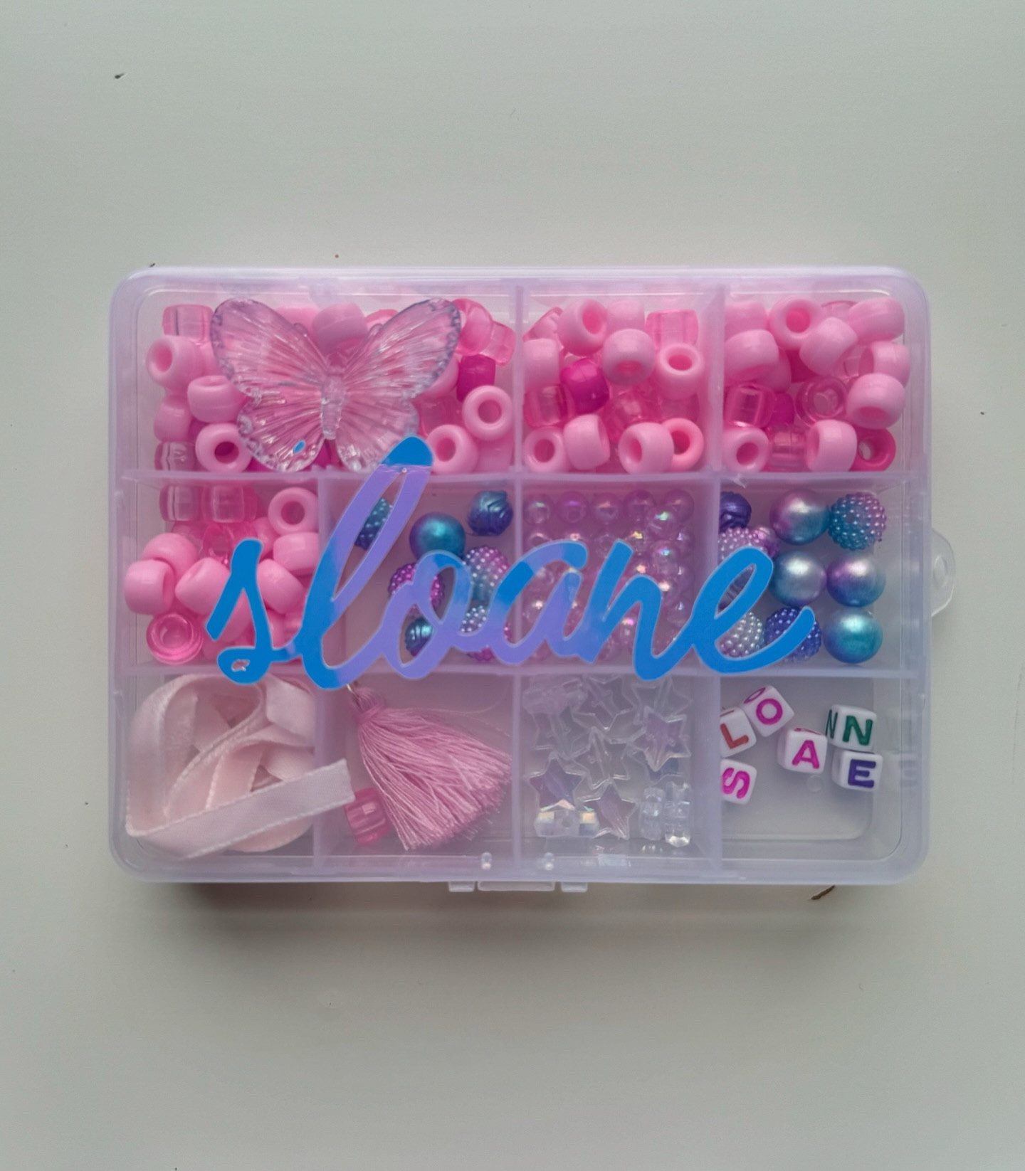 My sloane turns 5 tomorrow 💖 

For her Taylor Swift 5th birthday party on Sunday I made friendship bracelet bead boxes for all the little swifties’ party favors 👯‍♀️🪩🦋✨

I got cheap boxes on Amazon and then we (sloane and i) filled them with all different types of beads and charms and pretty string. 💗

My favorite touch was we picked out the letters of each girls name and put it in the box so it was easy for her to make her bracelet at home. I made iridescent name labels on my circuit machine (takes forever, but I still love doing it all 🥰)

Hope the girlies like them 🪩