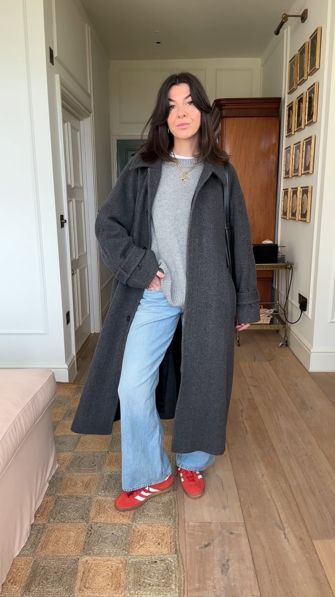 Long grey coat, grey jumper, blue straight jeans, red gazelle trainers

#LTKstyletip #LTKSeasonal #LTKeurope