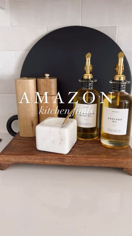 Amazon Kitchen Favorites 
Added some new Amazon finds to my kitchen. Marble and gold just elevate any space!

Marble butter keeper, marble salt dish with gold spoon, oil bottles with gold spout, gold measuring cups and spoons with wood handles

#LTKsalealert #LTKhome #LTKunder50