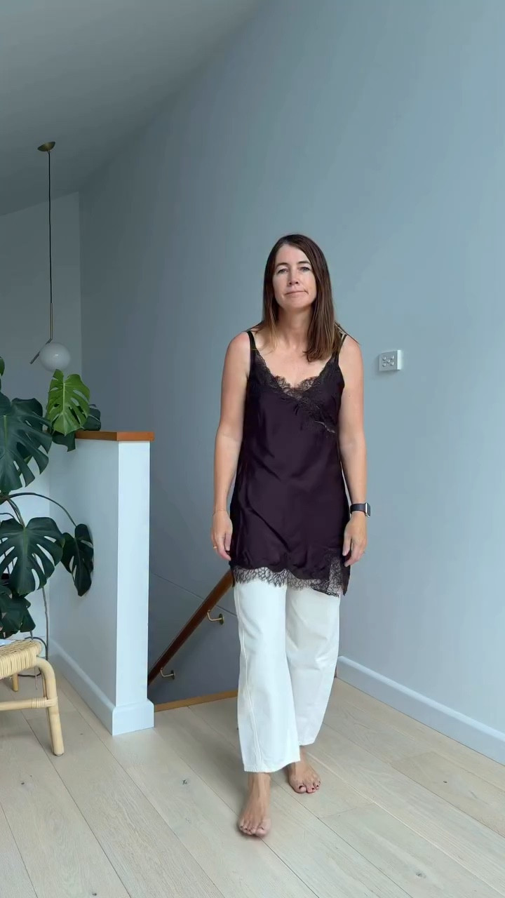 Autumn outfit inspo now that we are officially in my favourite season 🤎

I started with white barrel jeans for that modern, slightly structured silhouette, then layered a long brown lace slip underneath a brown cotton knit so the satin and lace still peek through. Soft meets strong - feminine textures styled in a way that still feels grown up and a little edgy.

Texture on texture instantly elevates a simple knit and denim combo, and the visible lace gives it that subtle undone vibe I love.

Finished with brown suede closed-toe kitten heels to keep it polished, plus a gold necklace and a chunky gold cuff worn over the sleeve for that unexpected edge. It’s those small styling details that take an outfit from basic to intentional.

This is my version of autumn dressing, warm neutrals, layered textures, relaxed tailoring and a hint of attitude.

OUTFIT DETAILS
Cotton jumper @glassons 
Satin lace slip @kmartaus 
Barrel jeans @zara.australia 
Suede heels @targetaus 
Gold cuff @annarossijewellery 

Modern style with edge for women 40+ who refuse to dress boring. Follow along 🤎

#autumnoutfit #over40fashion #dailyoutfitinspo #kmart #suedeheels 

#LTKWorkwear #LTKOver40