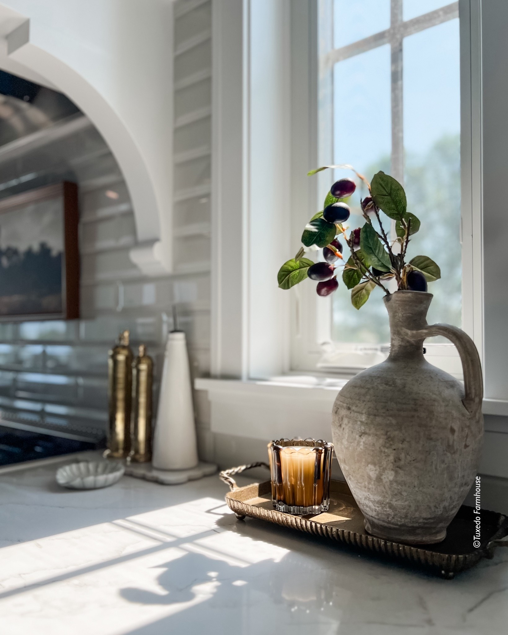 A pretty new Target candle on their fluted brass tray is perfect for fall in my kitchen  

#LTKFindsUnder50 #LTKHome #LTKSeasonal