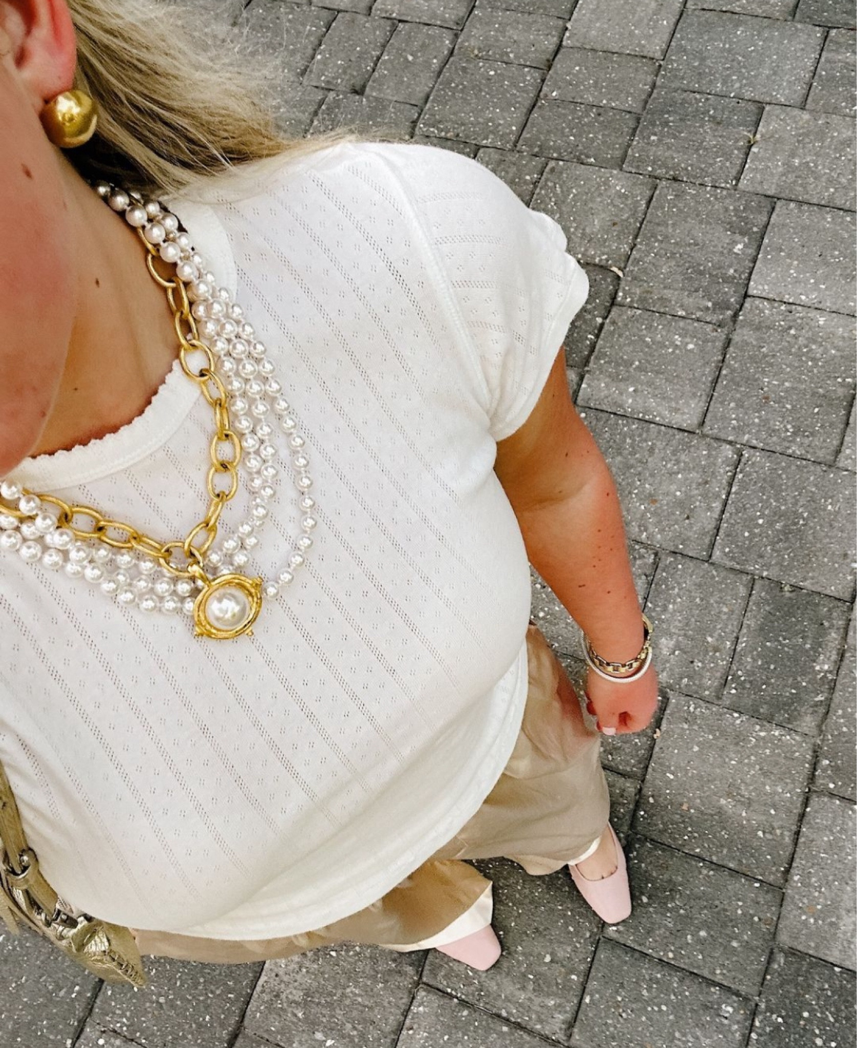 Love this pointelle tee to throw on with silk pants and some jewels! So feminine and chic!

#LTKStyleTip #LTKWorkwear #LTKFindsUnder100