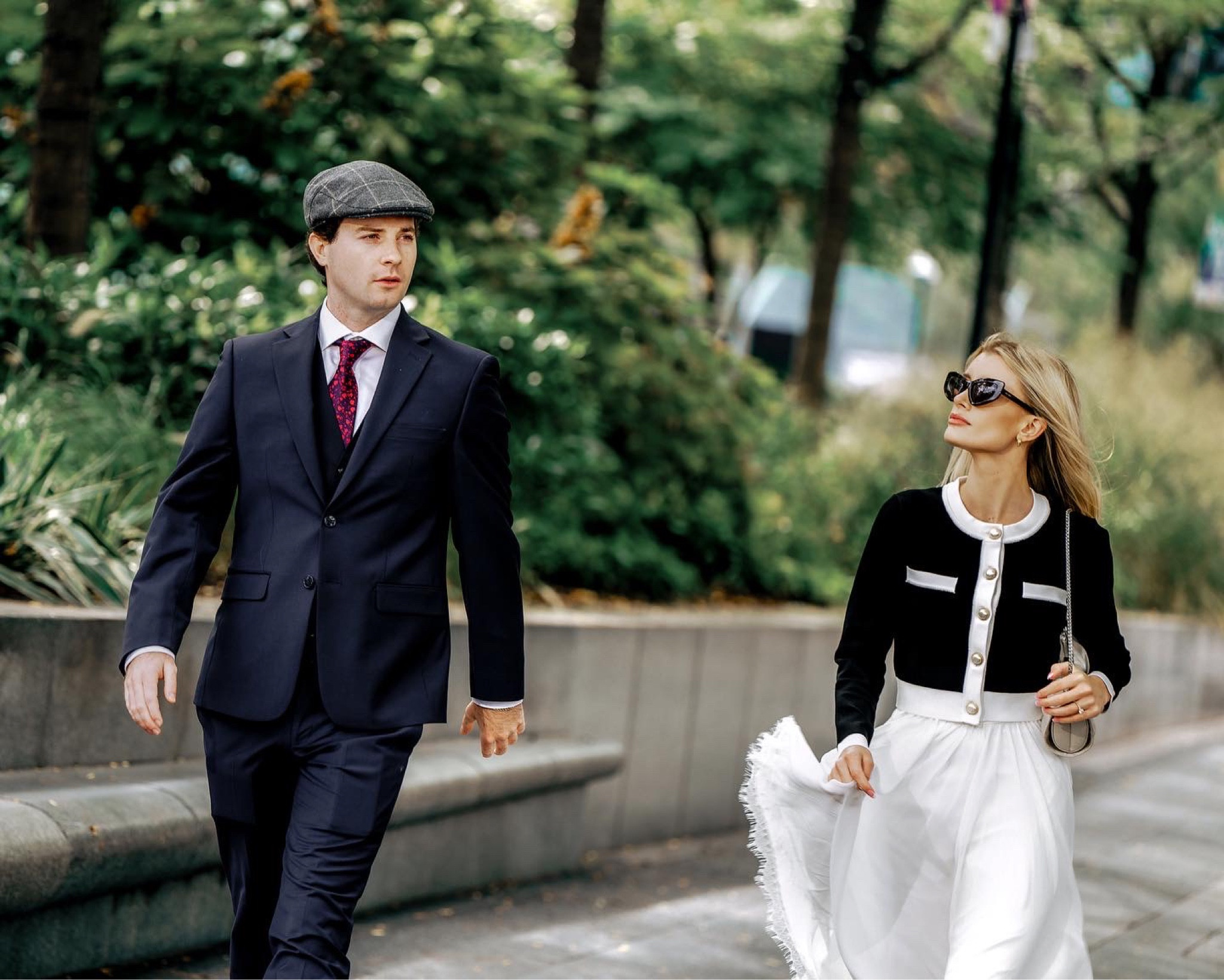 Engagement photos / Philadelphia engagement photos / Engagement photo outfits / city engagement photos / vintage outfits / twirl skirt / Mary Jane shoes / Philadelphia / city photos / black and white photos 