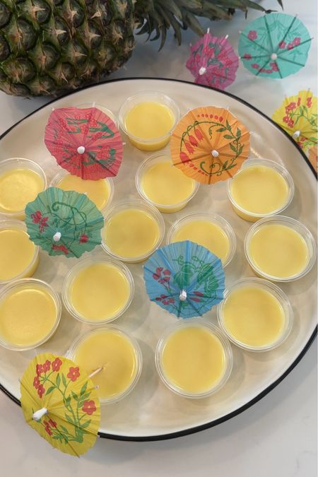 You’ll want to make these all summer long!! Get the taste of that iconic Disney treat with these Dole Whip Jello Shots!  You can find the full recipe on our blog youngwildme.com #DoleWhip #TropicalParty #JelloShots #SummerDrink #SummerParties 

#LTKSeasonal #LTKHome #LTKParties