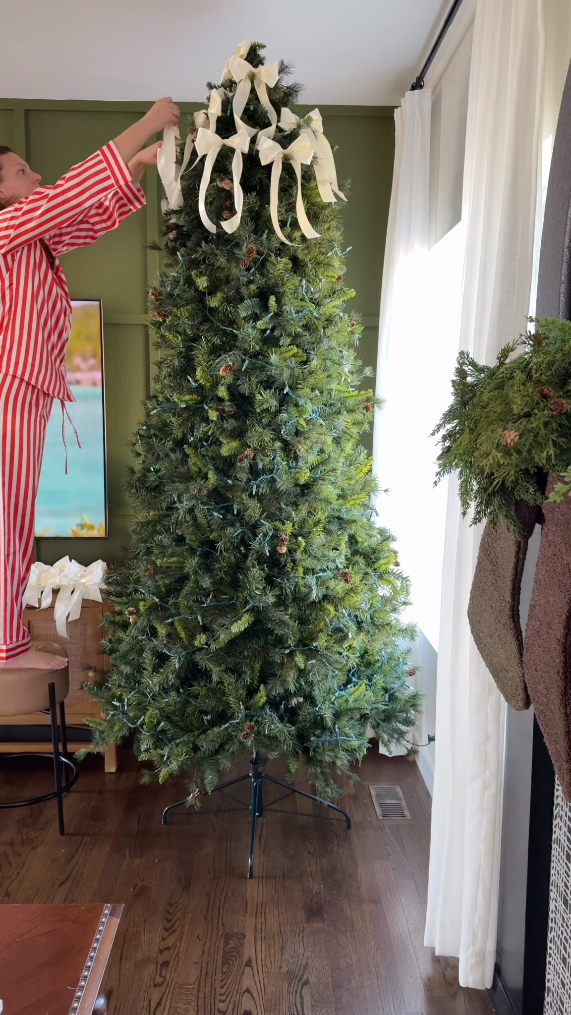 The making of the bow tree! I used two rolls of the satin ribbon from Amazon making this only $20 to do! 

#LTKFindsUnder50 #LTKHome #LTKHoliday