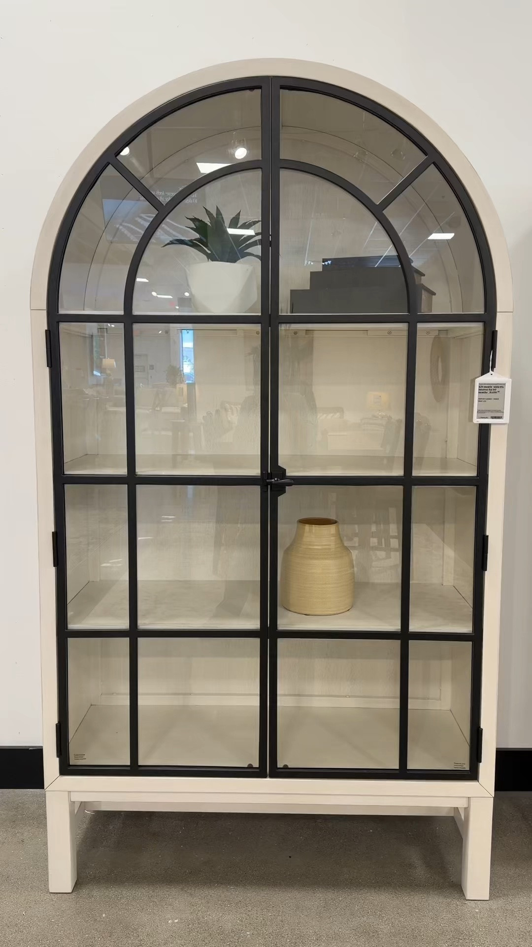 Statement storage piece! 😍 The Chadworth Display Cabinet from Ashley Furniture adds such a beautiful focal point to a dining room, kitchen, or living space. 🤍The glass/metal front  doors are perfect for showcasing favorite pieces, while the classic design gives it a timeless, collected feel. ✨ Shown here in white, but it also comes in multiple colors. Linked this cabinet and other similar styles here! ☺️ @Ashley #DisplayCabinet #StorageCabinet #FurnitureFind

#LTKHome #LTKSaleAlert