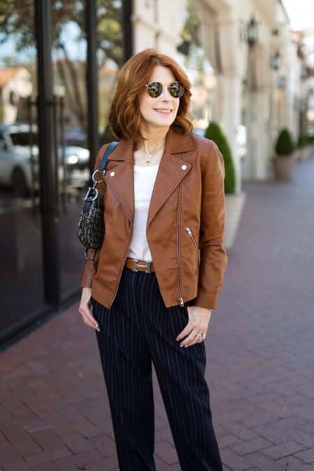 How gorgeous is this rich brown shade of this washed leather moto jacket from Quince!?

#LTKstyletip #LTKover40 #LTKitbag