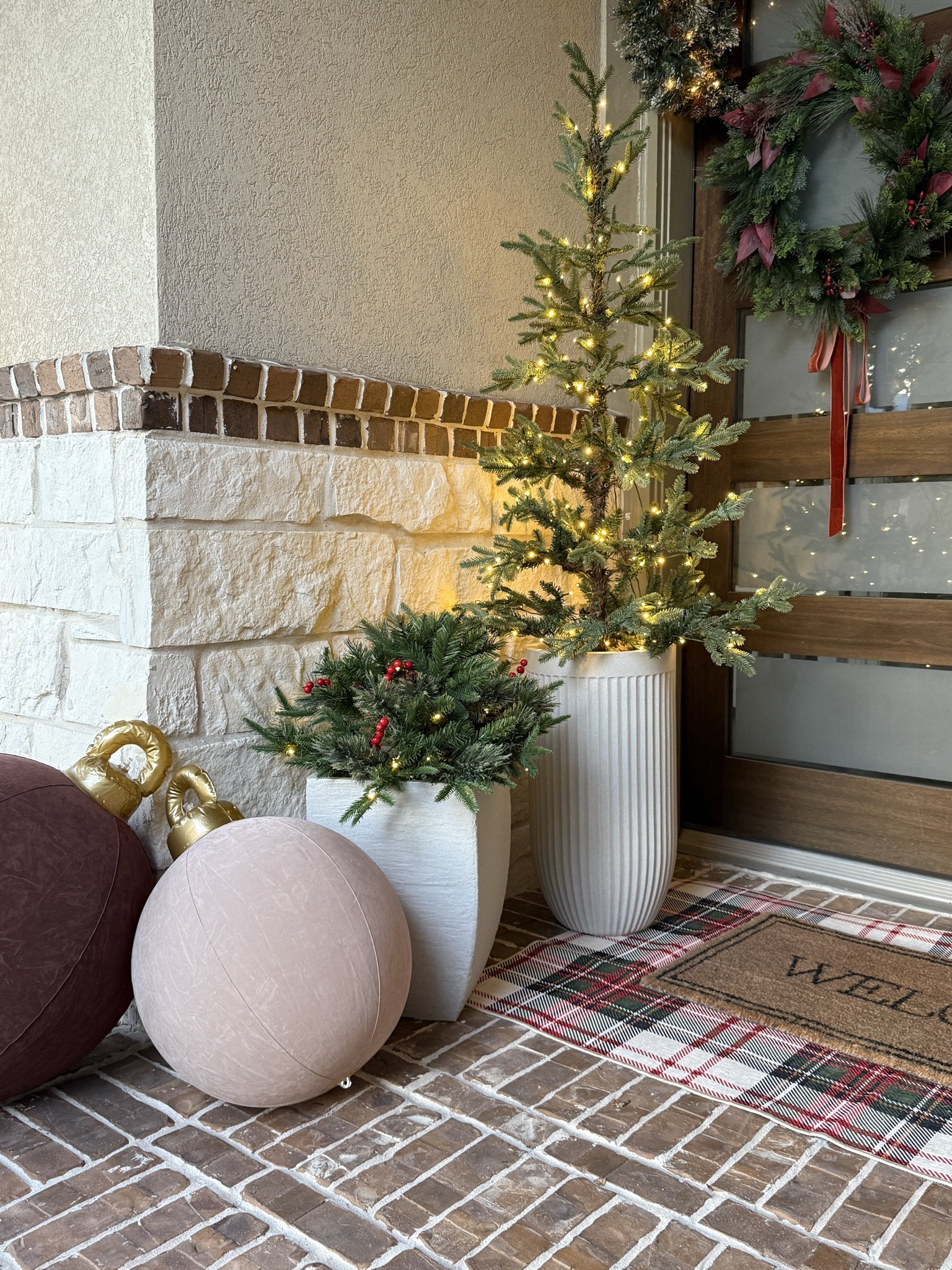 Simple, neutral, and festive: the perfect blend of natural greenery, soft light, and cozy holiday color, these planters and oversized ornaments make a beautiful statement without feeling overdone. Christmas porch decor, holiday planter ideas, classic holiday porch, outdoor greenery, Amazon Christmas finds, elegant front porch decor, Christmas lights, natural holiday greenery, beige white gray 

#LTKHoliday #LTKSeasonal #LTKHome