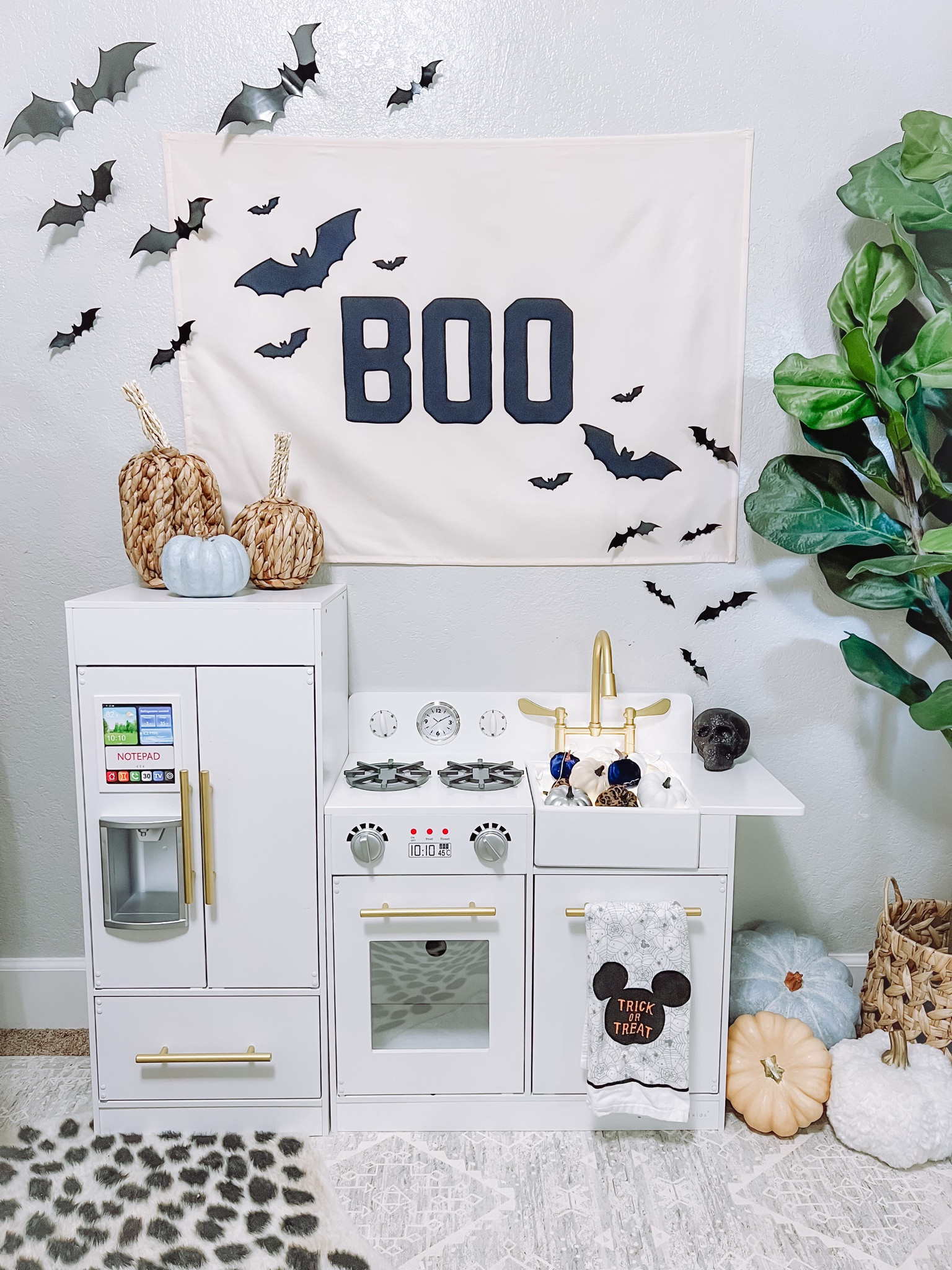 Halloween playroom. White gold kids play kitchen. Bats Blue and White leopard Disney Mickey Teamson play kitchen Boo Banner 

#LTKhome #LTKkids #LTKHalloween
