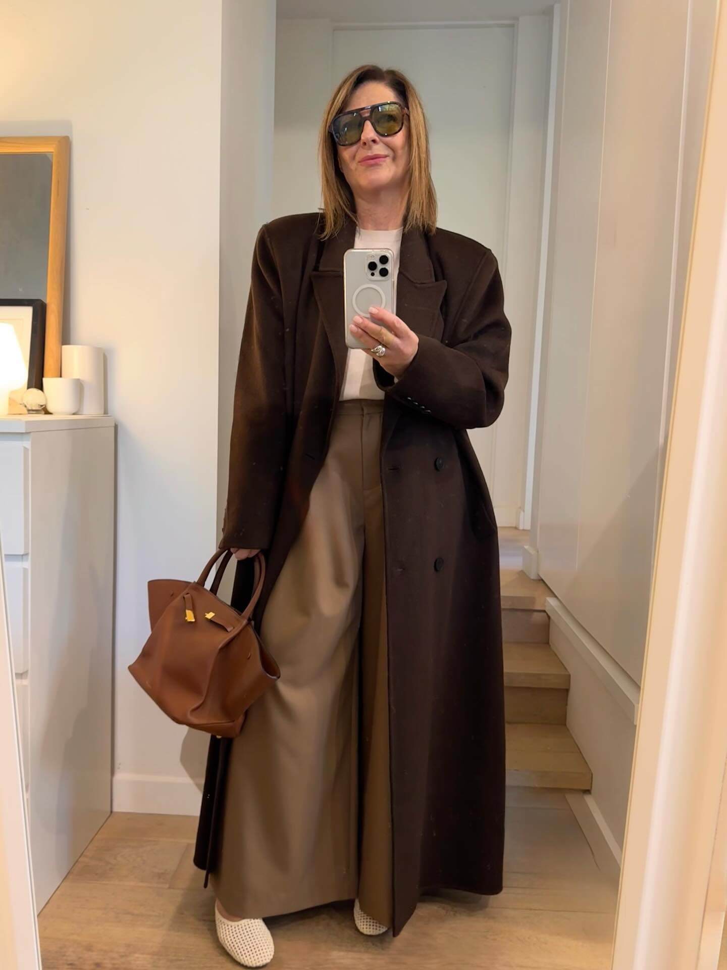 This is how you build a versatile modern wardrobe !
Do you recognize these chic camel pants @stylerunner ? ( now on sale !)
Do you remember this fab coat @netaporter ?
Did you nab one of those men’s cashmere knits @uniqloau ?
Did you invest in one of these divine tan bags @demellierlondon @netaporter?
Did you buy these cool white mules @zara ?

These are all great pieces I’ve nabbed this season and worn so many times , so many different ways. 

Because that’s the idea right ?

You want to get mileage from your wardrobe, great cost per wear, repeat & wear again. 
That’s how we all dress isn’t it !
What you won’t see here are pieces I’ve just worn once & will never see the light of day again.
Why?
Because I believe in being a conscious consumer and building a wardrobe of key pieces I’ll wear again and again.
Sure, I’m lucky enough to be gifted fabulous things but whatever I’m choosing I don’t just grab something wily nily. 

I ponder & take my time thinking about what I actually need, the gaps, the missing pieces & what will work back with what I already own.
I try (!) to buy fewer better things : better for your wallet, better for the planet.

The FiFi Philosophies; 
Stick to “expensive” versatile chic colours so that everything works seamlessly together ✔️
Update the classics into new modern shapes ✔️
( a long long coat, wide leg pants, slouchy knits)
Invest early in the trend & get years of wear ✔️
Think 3 colours on the body ✔️
White shoes change everything ✔️💯

I’ll post links in stories and you’ll find everything on my #shopwithfifi page @ltkaustralia 
#fifireport #fififavfinds #buildawardrobe #fifiphilosophy #ltkaustralia