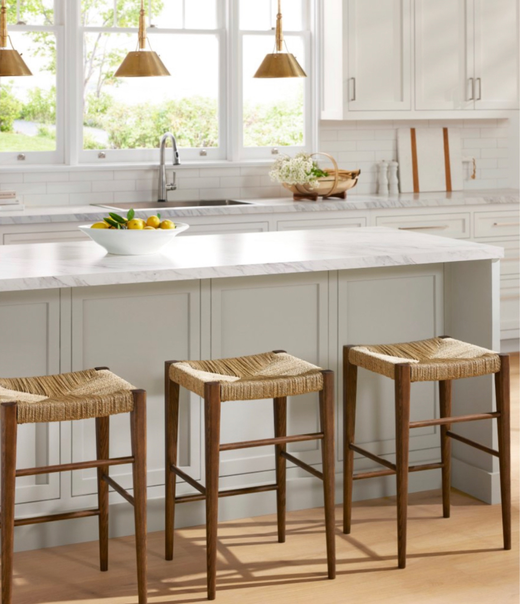 Ready for spring festival get-together?  It’s the perfect time to refresh your kitchen island  to elevate your entertaining game. We love the minimalist brass pendants and relaxing rattan bar stools. 20% off at Serena&Lily with code SPRING 
#kitchenisland #barstool #brasspendants

#LTKhome #LTKFind #LTKsalealert