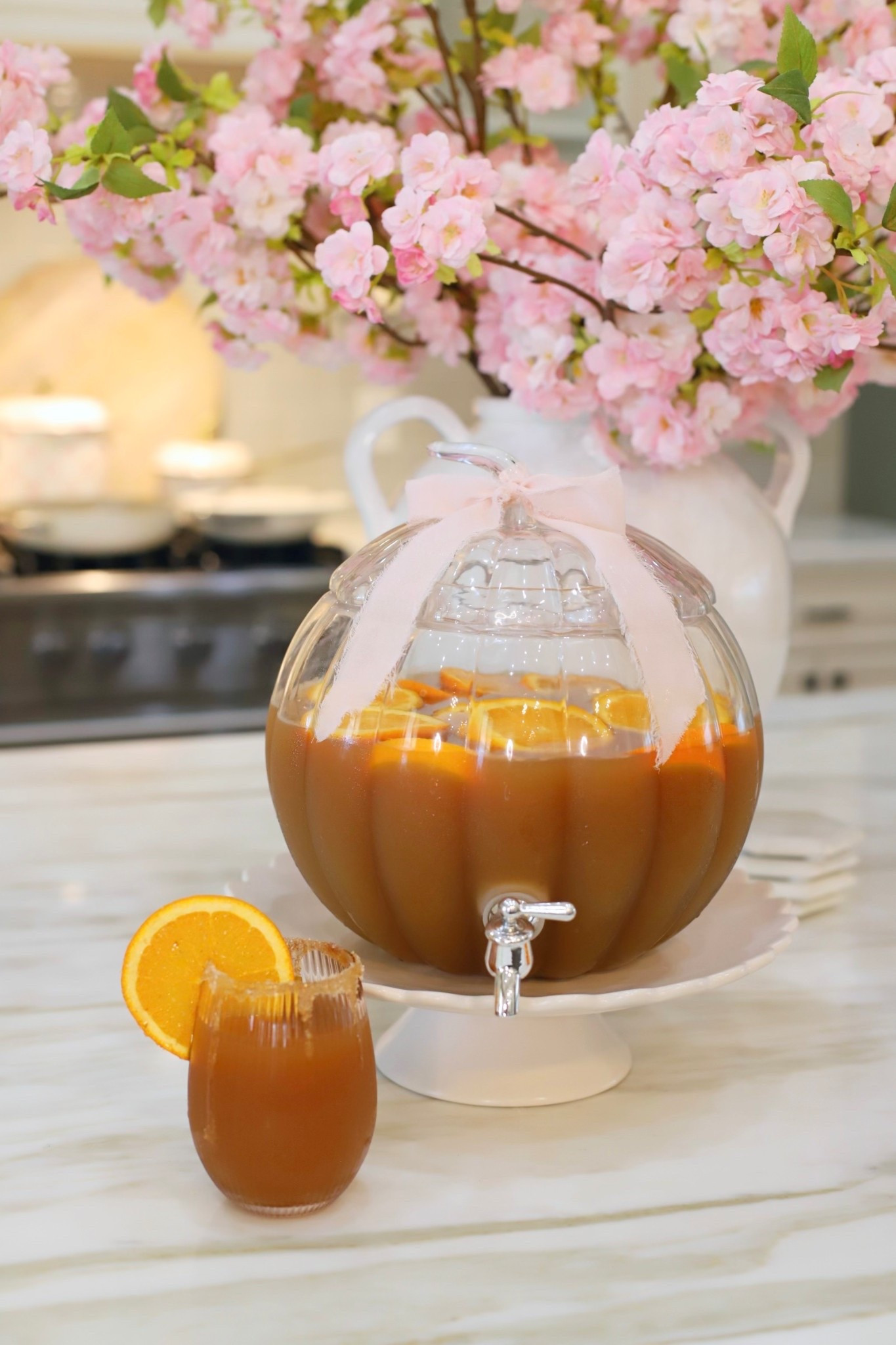 Milo’s Sweet Tea Fall Party Punch. Perfect for football tailgates or thanksgiving! See full recipe below! 

Ingredients:

1 Gallon @drinkmilos Sweet Tea
2 cups orange juice
2 cups pear juice
½ tsp ground cinnamon (or a cinnamon stick for garnish!)

Comment “Fall Punch” to shop Milos Sweet Tea + this cute pumpkin drink dispenser. #MilosMomentMakers #FallDrinks #hostingideas 

#LTKHoliday #LTKSeasonal #LTKParties