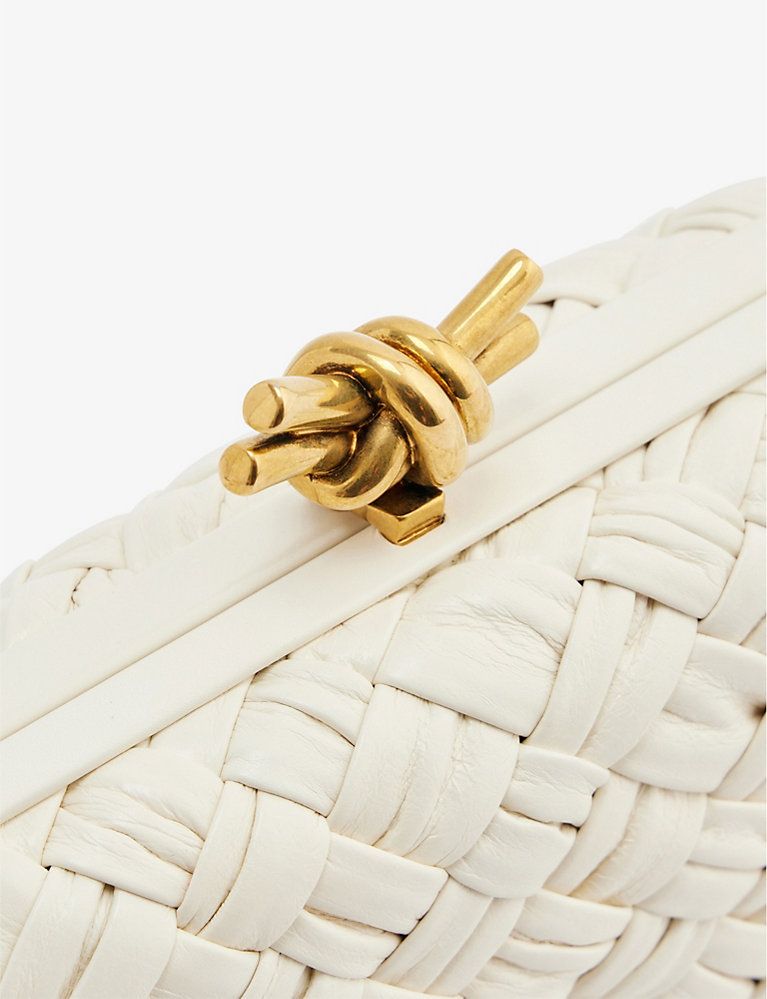 Knot intrecciato-woven leather clutch bag | Selfridges