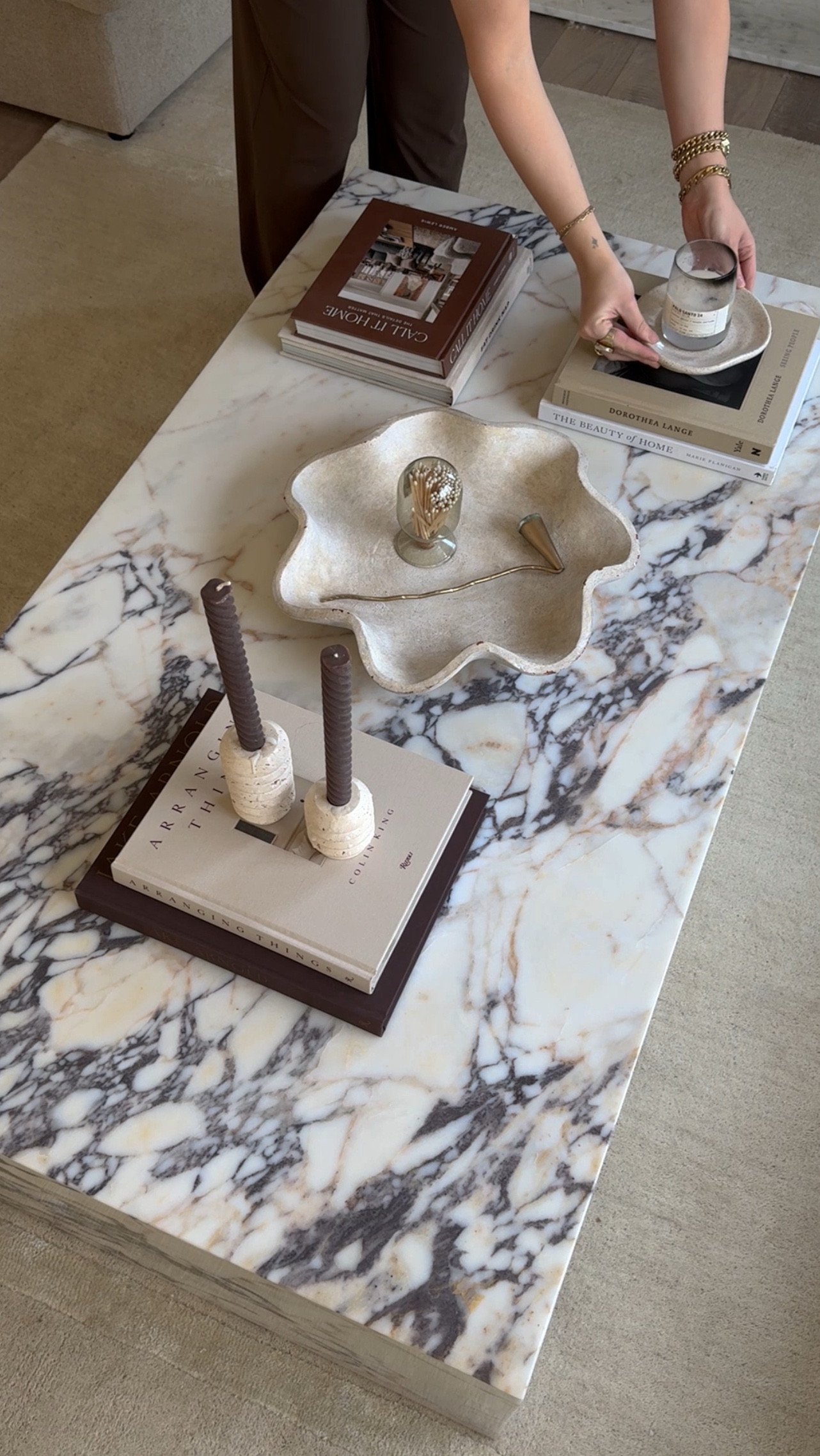 Style my dream marble coffee table with me 🤍 @manhattan.home.design
 This piece has lived on my Pinterest board for years and now she’s officially in my living room. Pinch me. The veining, the tones, the plinth shape—it’s everything.

I have the large 56” Calacatta Viola version of the Copenhagen Marble Plinth Block Coffee Table, and it’s even more stunning in person—the bold veining and rich tones make it the perfect statement piece for any neutral space.

Comment “MARBLE” for a link sent straight to your DM & as always, shop this post on my @shop.ltk page (🔗 in bio)
.
.
.  #marblemoment #neutralvibes #interiorstyle #ad #liketkit #ManhattanHomeDesign #interiordesign #livingroomdetails #livingroomstyling #livingroomgoals #marblecoffeetable #cozyhomevibes #beautifulhomeinspo #modernhomedecor

#LTKHome #LTKFindsUnder50 #LTKStyleTip