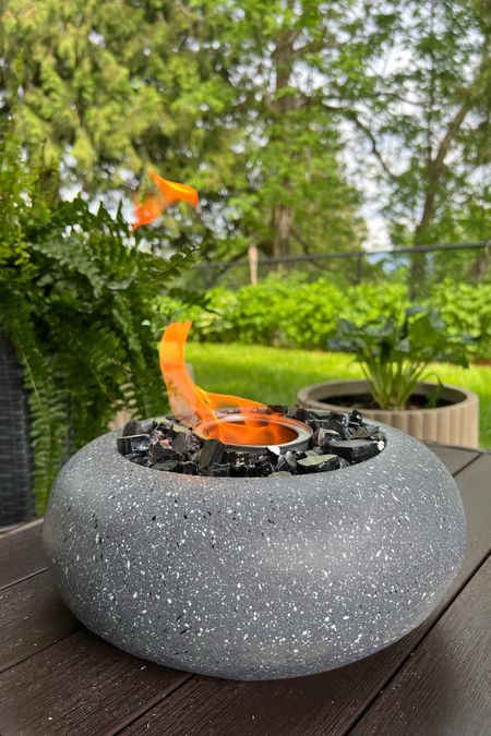 The prettiest fire glass..this is black onyx. I love it! 
With this fire bowl, I use 99% rubbing alcohol. 
Outdoor inspiration, summer living, patio decor 

#LTKfindsunder50 #LTKSeasonal #LTKhome