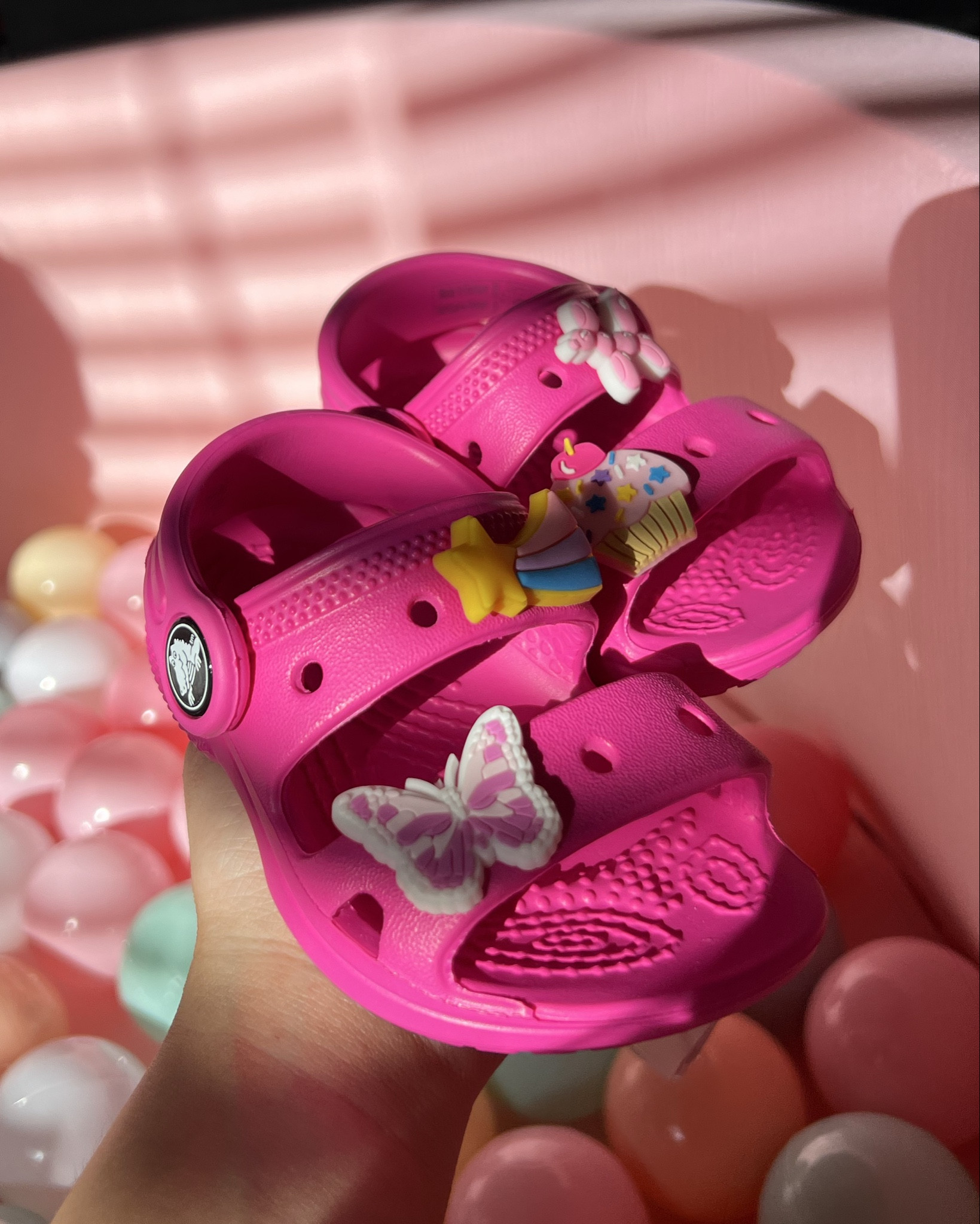 Cutest toddler shoes ever? These bright pink Crocs with charm clips are a hit in our house—easy to slip on, wipe clean, and full of personality. 💖✨

#LTKKids #LTKSpring #LTKFinds #ToddlerStyle #MomLife #CrocsStyle #ToddlerMustHaves #LTKUnder50 #StayAtHomeMom #LTKMom