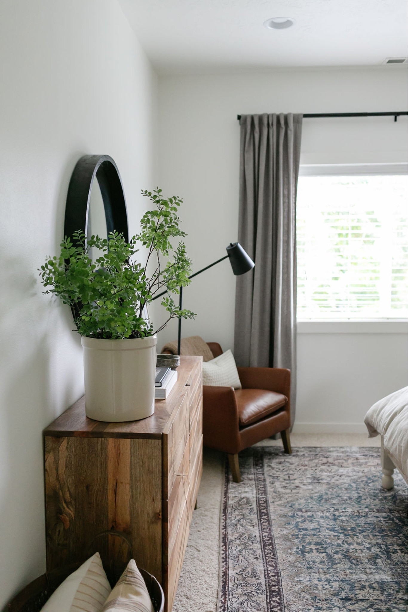 Pottery Barn leather chair, armchair, Amazon home decor, Pottery Barn drapes, Target floor lamp, gray curtains, Pottery Barn faux stems, Loloi x Amber Lewis area rug, Amber Interior ms, West Elm dresser, bedroom furniture, bedroom decor, home decor, 

#LTKHoliday #LTKsalealert #LTKhome