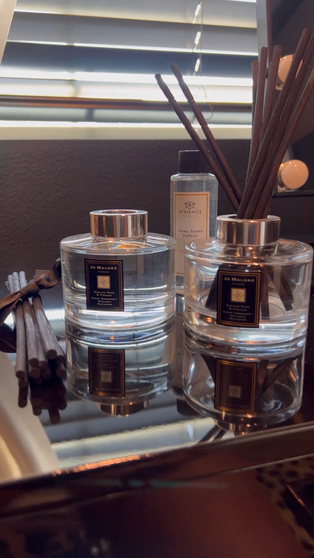 I found a dupe of the Jo Malone English Pear and Freesia Diffuser from Macys. I love the way that these smell I also like to style with them! 

I use the empty containers and refill with my dupe and style around my home. I buy a new one and put it in my bedroom since this is the room I spend the majority of my time in, so I want to enjoy it! 

These are pretty pricy so I love that the dupe from Macys is almost exactly alike. 

Hope you enjoy! 

#LTKstyletip #LTKhome #LTKFind