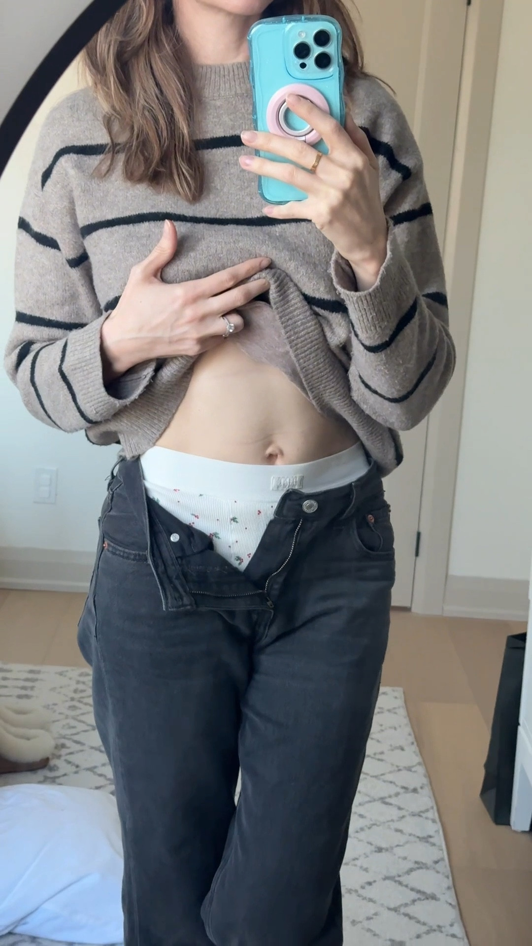 Fit check! Giving my SKIMs boxers a moment here. It’s like his boxers, only cooler. It has cool and breathable stretch-cotton. In this cold winter if I can add an extra layer then it’s totally worth it lol I remember when I was a kid I would wear long johns under my pants haha and here we are wearing boyfriend inspired boxers under my Levi jeans to keep warm this winter! These are in a size small. The 3-packs are a great gift and they usually go on sale because they’re limited edition. 

#LTKholiday #LTKwinter #LTKgiftguide