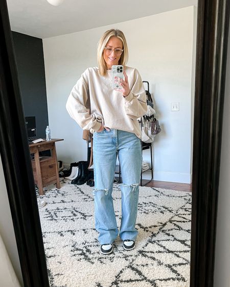 Spring outfit. Spring outfits. Casual outfit. Casual outfits. Crewneck sweatshirt. Oversized sweatshirt. Wide leg jeans. Sneakers. 

Sizing
Sweatshirt is an XXL.
Jeans are from Zara and cannot be linked, but I linked similar options.
Shoes are a 9 and fit TTS.

#LTKstyletip #LTKunder100 #LTKunder50