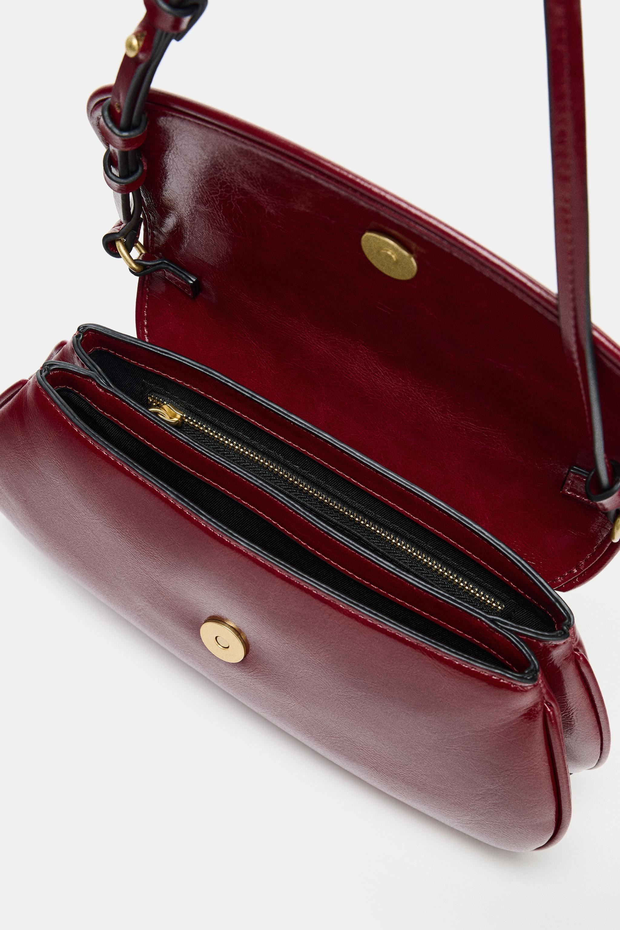 Shoulder bag. Adjustable shoulder strap. Interior zip pocket. Magnetic button and flap closure.He... | Zara US
