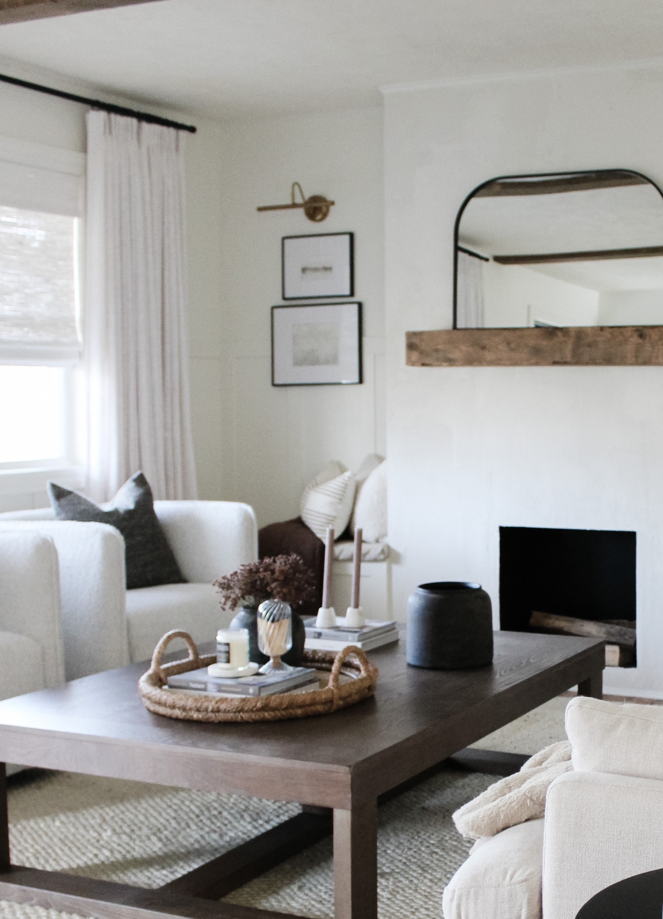 Linen pinch pleat drapes. Builtin bench nook. Picture light & neutral art

Digital art. Neutral art. Brass lights. Picture light. Arch mirror. Pinch pleat drapes. Curtains. Linen curtains. Look for less curtains. Semi-Custom curtains. Living room. Great room. Home decor  

#LTKunder100 #LTKsalealert #LTKhome