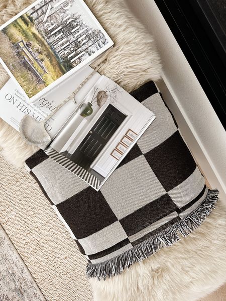 Obsessed with this throw checkered blanket! The fringe is is gorgeous and the weave has such a beautiful texture! Add the perfect amount of contrast and can add flair to any home decor. 

#homedecor #checkered #books #coffeetable #bench #jennikayne #amazon # target 

#LTKunder50 #LTKFind #LTKhome
