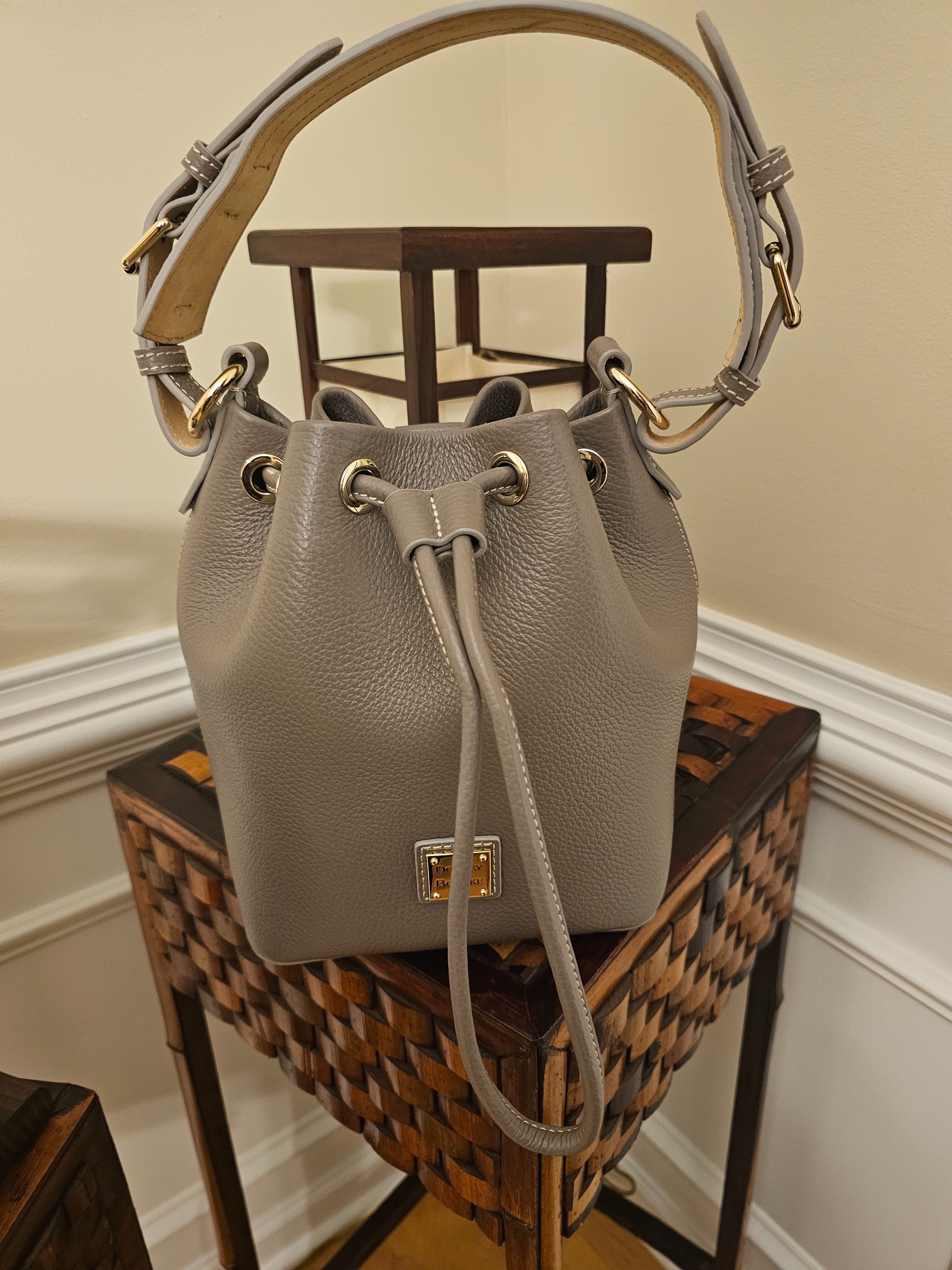 Small drawstring bag that packs a punch!  Classic neutral color, holds all of the essentials and then some.  Crafted with Italian artisan details and IMO the best shoulder strap of any brand.  You won’t be disappointed.

#LTKStyleTip #LTKWorkwear #LTKItBag