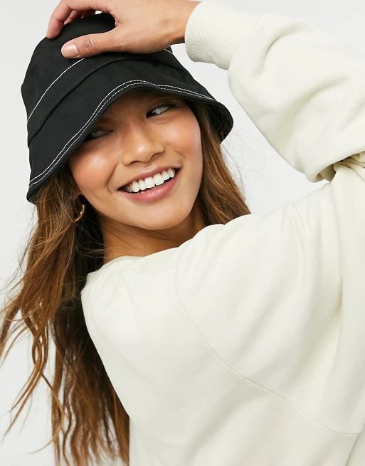 ASOS DESIGN canvas bucket hat contrast stitch in black | ASOS (Global)