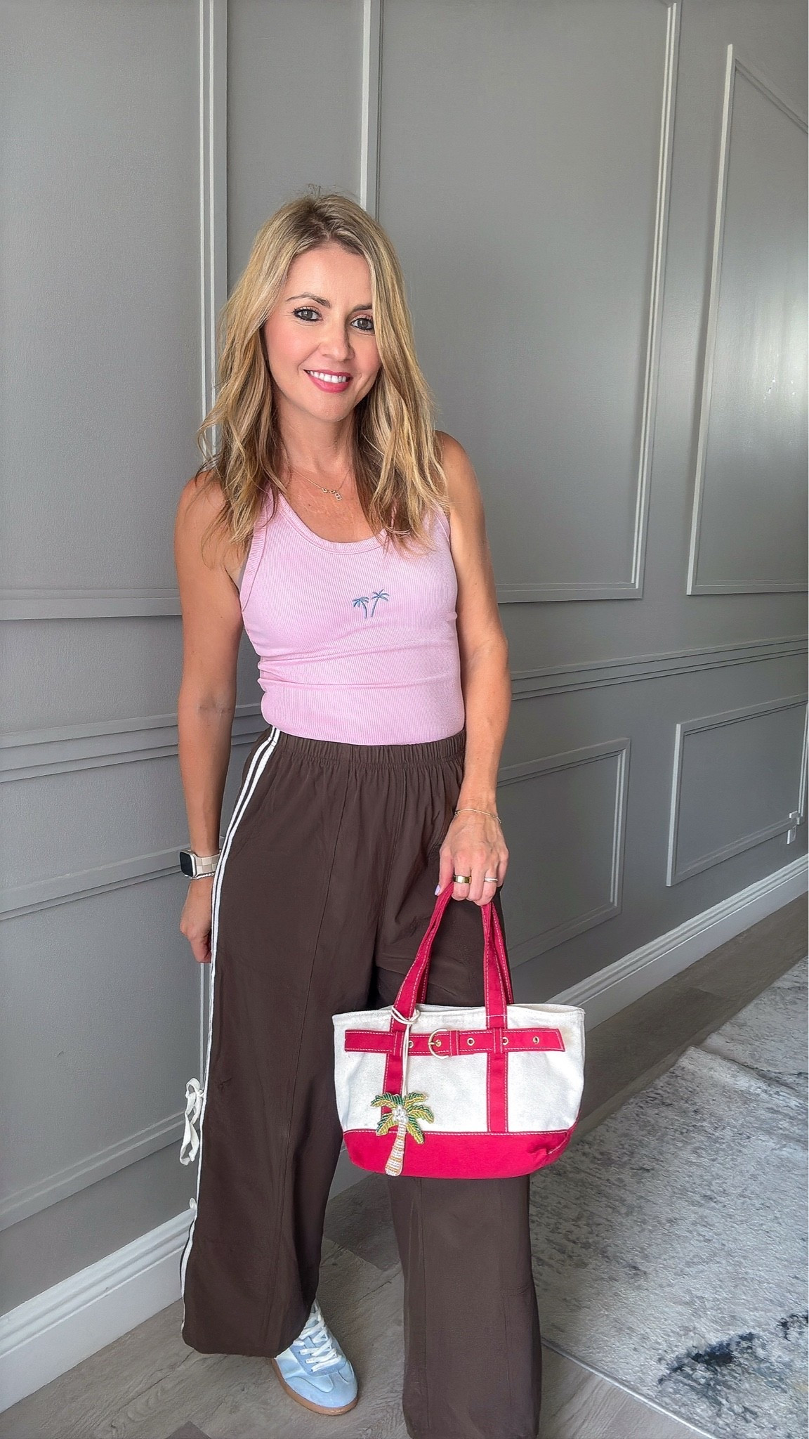 Sporty. I’m look- styling track pants for summer.

#LTKgrwm #LTKootd #LTKmomlife