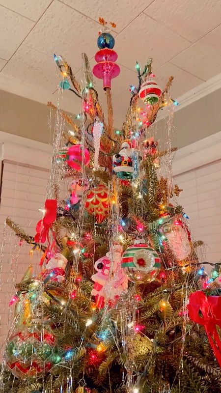 First live tree in a decade…loaded down with lights, nostalgic ornaments and TINSEL! 

#LTKHoliday #LTKSeasonal