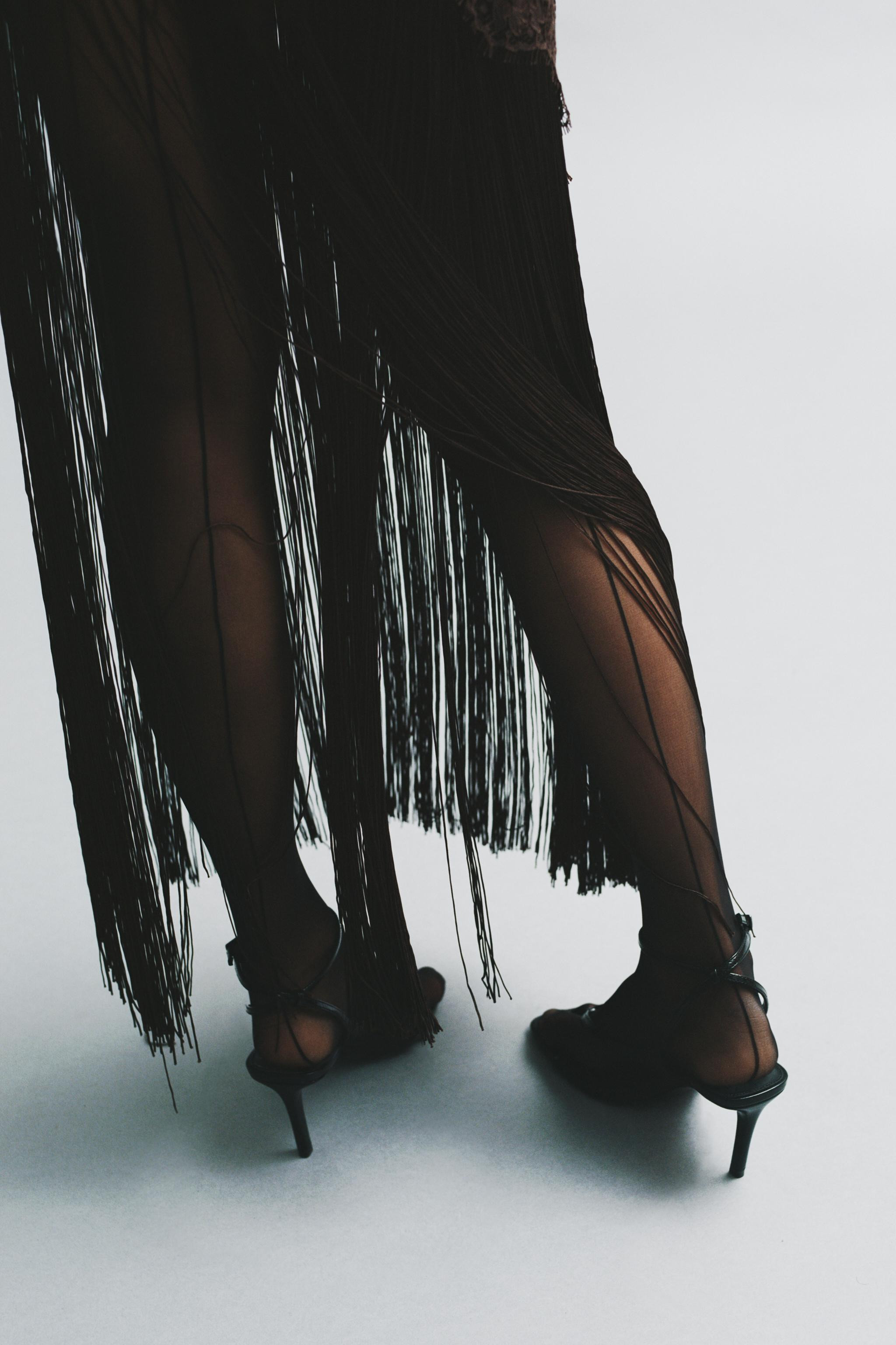 Semi-sheer dress made from soft lace fabric. Featuring a straight neckline and thin straps. Match... | Zara UK