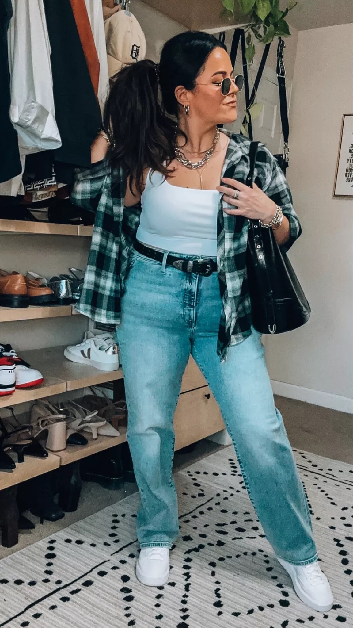 Midsize fall outfit idea - flannel plaid button down top wearing an xl (it has pockets) Straight leg jeans size 14 White sneakers tts Cropped tank large Bucket bag Mixed metal accessories

#LTKstyletip #LTKmidsize #LTKSeasonal