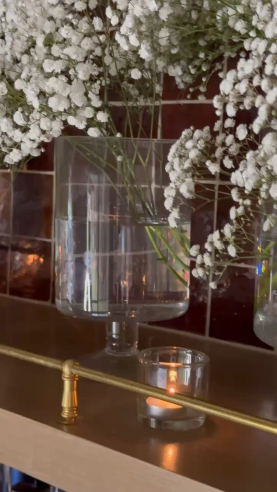 Designer tip: use your glass hurricanes as vases for simple floral arrangements! Super easy hack and great way to repurpose what you already own!

#LTKSeasonal #LTKHome #LTKStyleTip