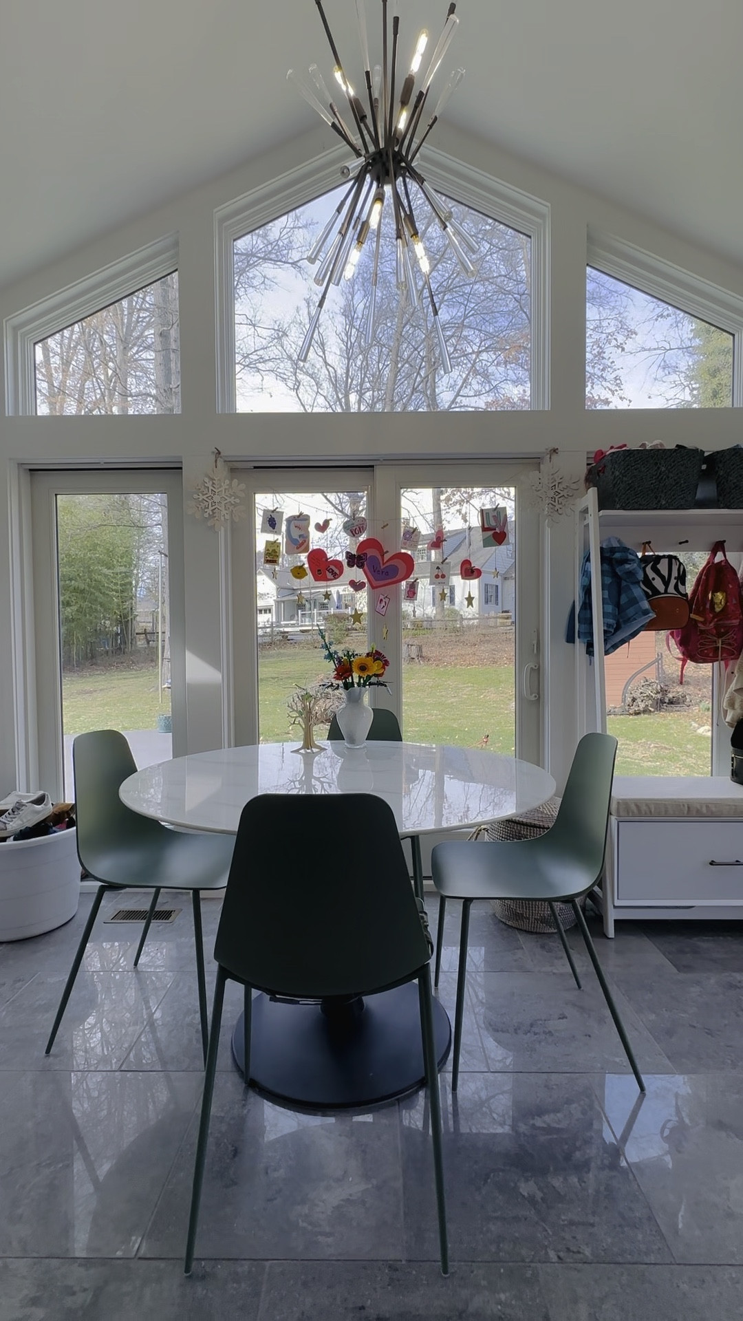 ❔Want to know why it’s so rare for me to share this corner of my home…

🛑Beacause it’s typically a hot mess! As a mom of 2 under 6 things just explode in this space! 

👩 Fellow mama’s, you can probably relate… 

✌️ PLUS This is the in & out zone of our home-the mudroom- AND the table where we at 99% of our meals! 

☀️So it’s rarely ever photo ready! here she is today - clean & in all her sun soaked glory 

✨ Here’s are some tips you can apply to your own home & shop everything you need right here! 

🤍Seasonal Decor Tips! 

 📸 1. Use a photo hanging garland to display your valentines for a few weeks… soak in all the love 

🌹 2.Add those seasonal LEGO flowers to your bouquet for a fun pop! 

Storage tips
 
👟 shoe storage is a must, no it’s not ideal eating near shoes but when they’re tucked away we don’t notice them! 

🧥Our Petite coat rack with a drawer is one of the best finds for our dual mudroom/ kitchen nook/ sunroom. It’s a great piece for a small space and functions like a dream! 

🧺 Lidded basket! If you’ve been here a while you prob know I am obsessed with these! This one hides all our plastic bags and then once it’s full it’s right by the door so you can take them to recycling at Home Depot 

👀 See something missing? Let me know over on the ‘gram @greatoakhaven and I’ll send you the link 🫶

Thanks for being here Home Lovers! 
-Kelly 

#LTKSeasonal #LTKfamily #LTKhome