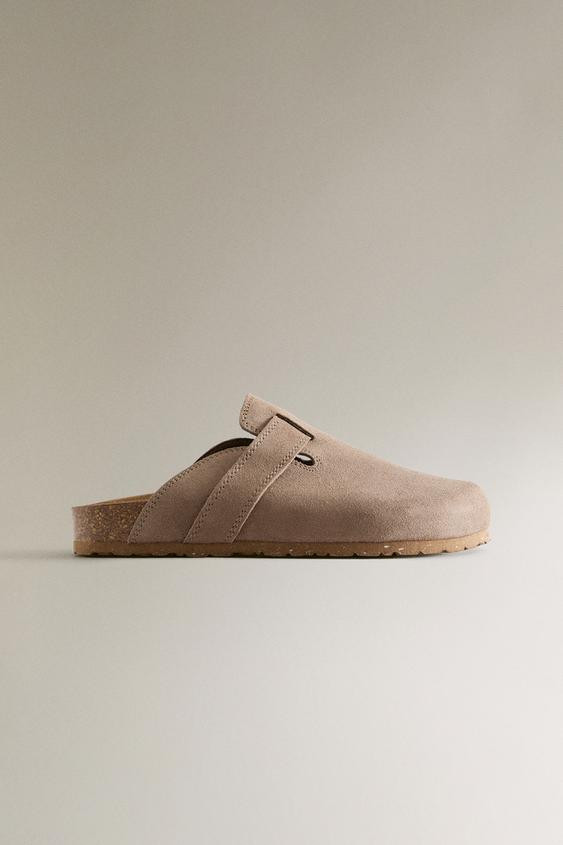LEATHER CLOGS WITH STRAP49.99 GBP  Beige1203/500/832Put it in your basketAddFlat leather clogs wi... | Zara UK