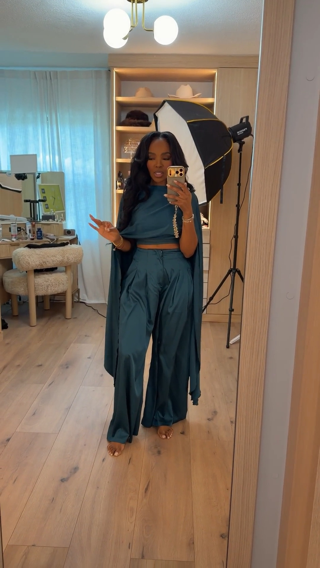 An effortlessly dramatic moment in rich teal — this flowing two-piece set brings all the movement with its draped shoulder detail and wide-leg silhouette. The soft satin finish catches the light beautifully, while the cropped top keeps the look modern and balanced.

It’s one of those outfits that feels bold without being overdone, making it perfect for when you want statement energy with zero effort.

Perfect for holiday dinners, resort evenings, and elevated special occasions.

📏 Sizing: Small  
Height — 5’4”  
138 lbs  
Bust — 34D  
Waist — 27”  
Hips — 40”  
For pants/jeans: 27 Long or 4 Long

Tap to get details

Satin two-piece sets, draped shoulder outfits, chic holiday looks, flowy wide-leg styling, elevated occasionwear, bold color moment fashion.

Follow me on Instagram and YouTube @kirasfashionfinds

#LTKootd #LTKgrwm