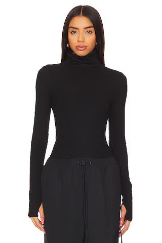 Splits59 Jackson Rib Turtleneck Top in Black from Revolve.com | Revolve Clothing (Global)