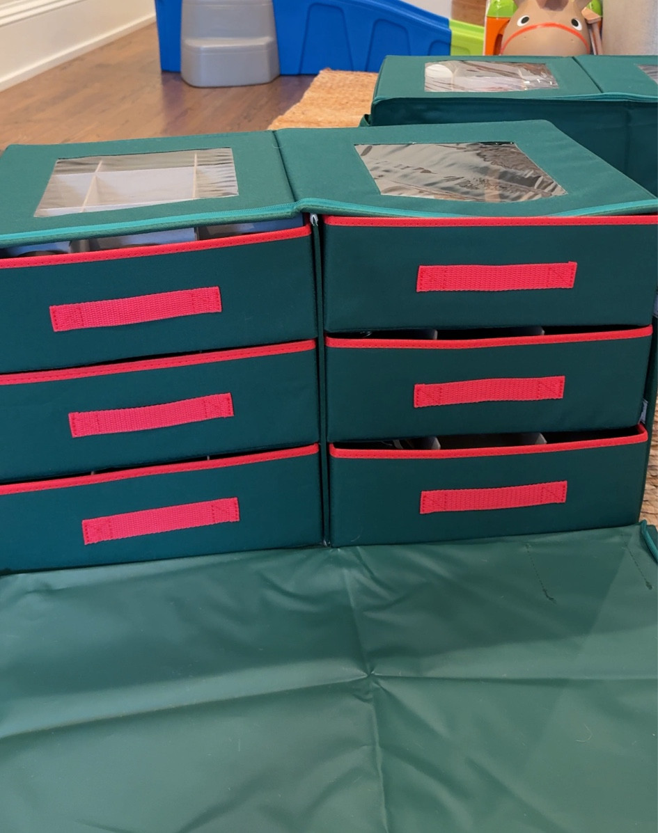 The BEST Christmas ornament storage! It fully zips to protect everything from dust, each drawer pulls out so everything is easily accessible and it’s very sturdy. 

We have larger ornaments so we got the 4” dividers although it also comes in 3”  

#LTKHome #LTKSeasonal