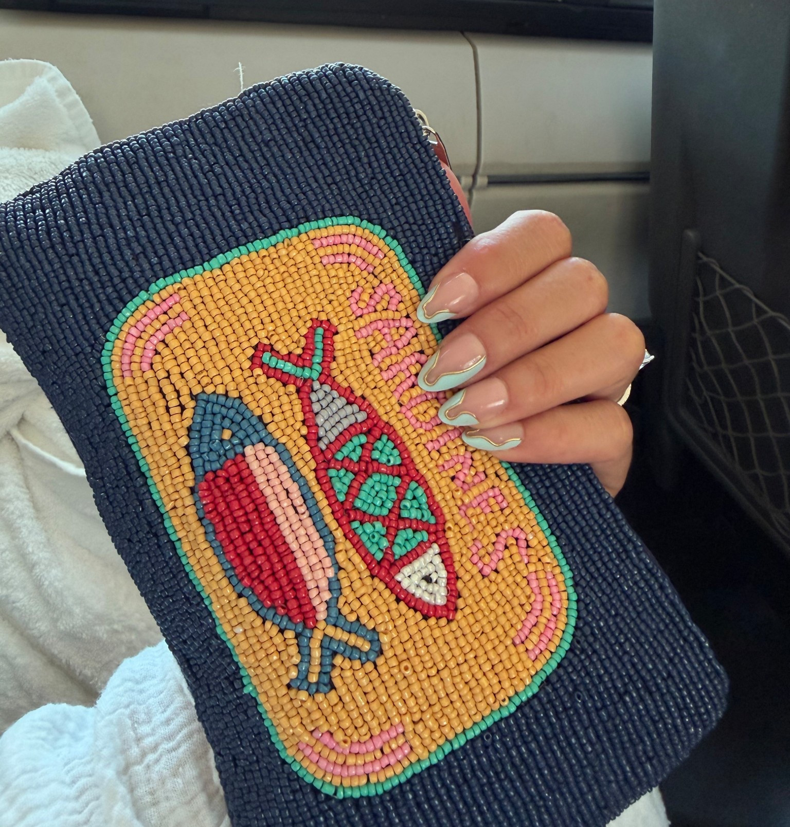 Nails 😍 and pouch 🤌🏼 #vacationstyle #nails 

#LTKBeauty #LTKSeasonal #LTKootd