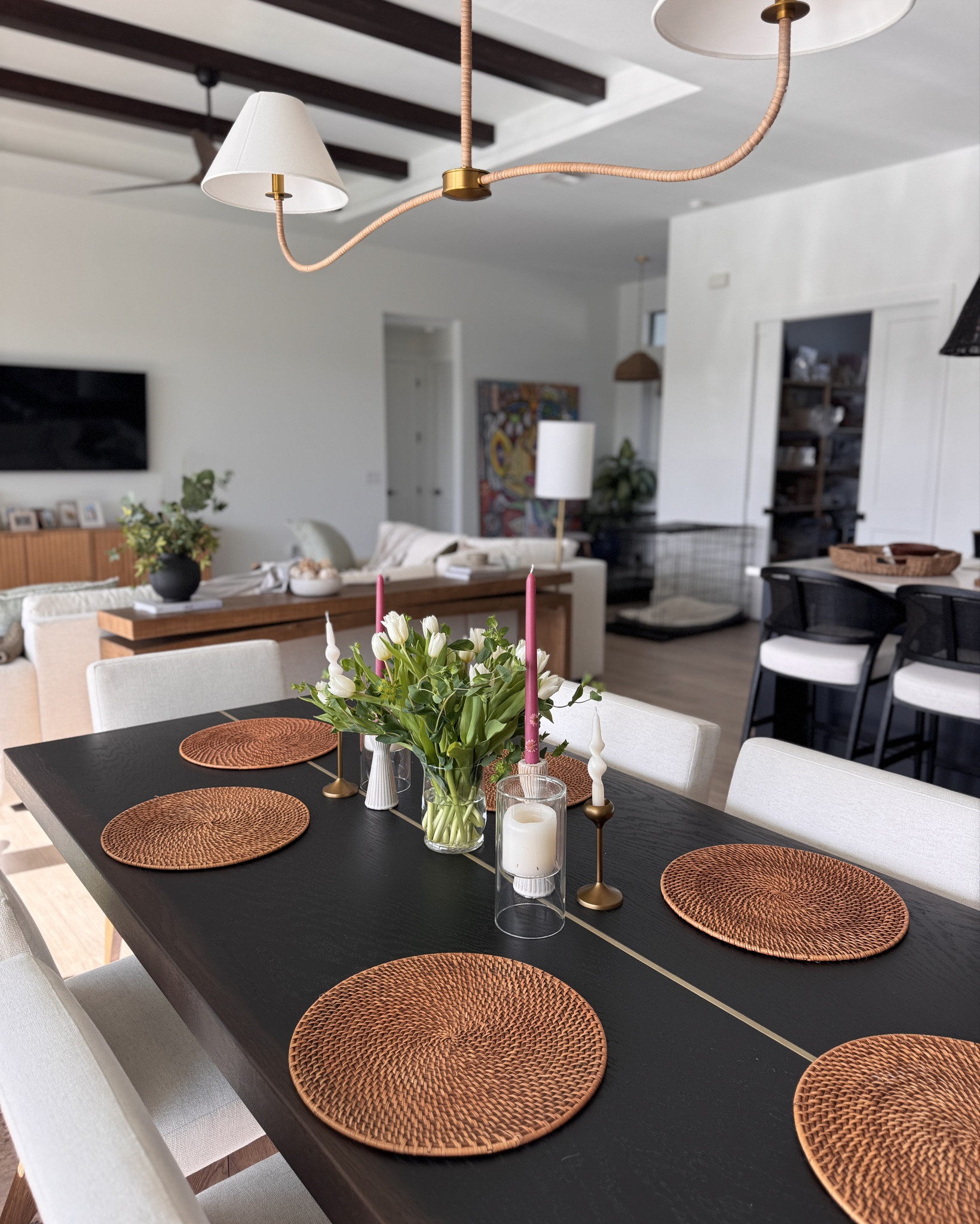 Simple dining table set up to bring a little Easter to the house for the weekend 🤍 

I love my dining room table from Arhaus it was one of the investment pieces we made when building our house. It’s a place we gather and sit at every night we have no regrets 🙌🏻 

I bought these placemats almost 10 years ago from @Crate & Barrel which obviously means they are a timeless investment they have lived in all of our homes seamlessly. 

I picked up a bunch of taper candles from Joann’s before they closed what a deal! These flower ones are such a great dupe for Anthropologie. 

I don’t like to buy seasonal items so my candleholders from World Market remain neutral and I’ll spice  things up with a fun candle which i will throw away once it burns anyways. Investing in timeless things is my style so stick around if you want to invest in making your life timeless and curated. 

#LTKHome