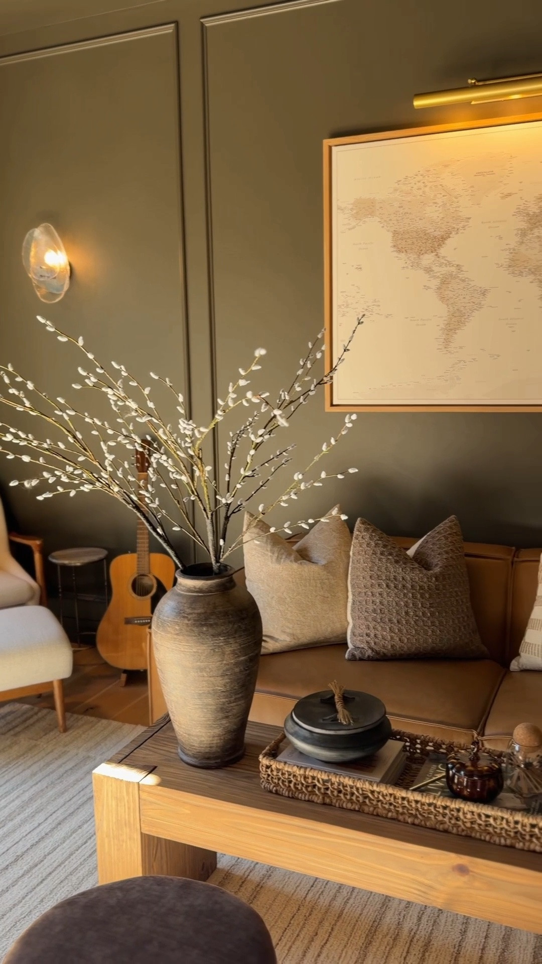 Moody den design, dark and cozy living room, warm neutral home decor, Sherwin-Williams Tungsten paint, organic modern interiors, Mediterranean-inspired home, cozy den inspiration, dark wall paint ideas, layered neutral decor, warm wood tones, built-in shelving, timeless interior design, sophisticated family room, inviting home styling, Home with Chrissy M. 
@Pottery Barn

#LTKdayinmylife #LTKSeasonal #LTKHome