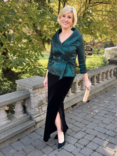 Look holiday perfect in this gorgeous holiday party outfit consisting of a long black velvet skirt and green taffeta wrap top. #styleover50 #holidayparty 

#LTKSeasonal #LTKHoliday #LTKwedding